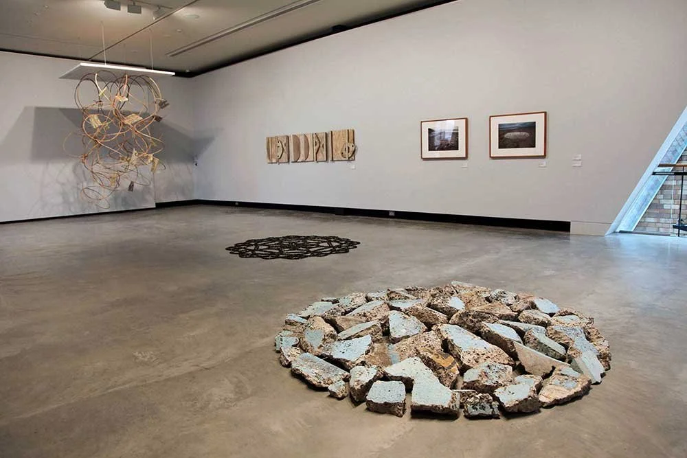 Installation view of various works exhibited in Object Urbanites, Maitland Regional Gallery 2015 (two works by Alison Coates in view back left)