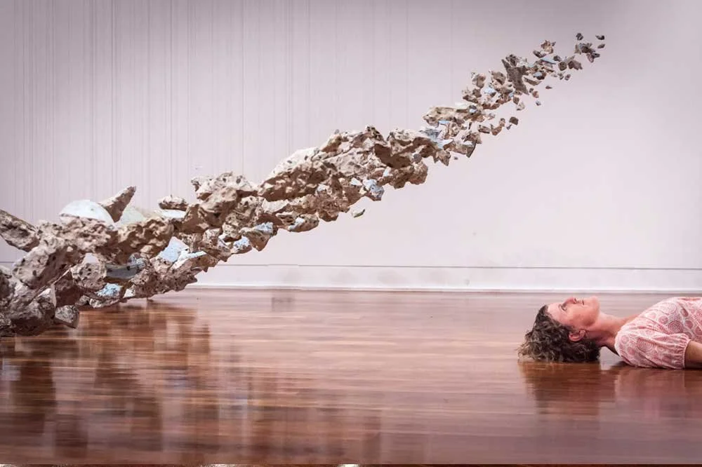 Pool, the Alchemy of Blue, 2013 (detail with artist), foraged concrete, piano wire, fishing line, nails, metal grille, approximately 4.7 metres