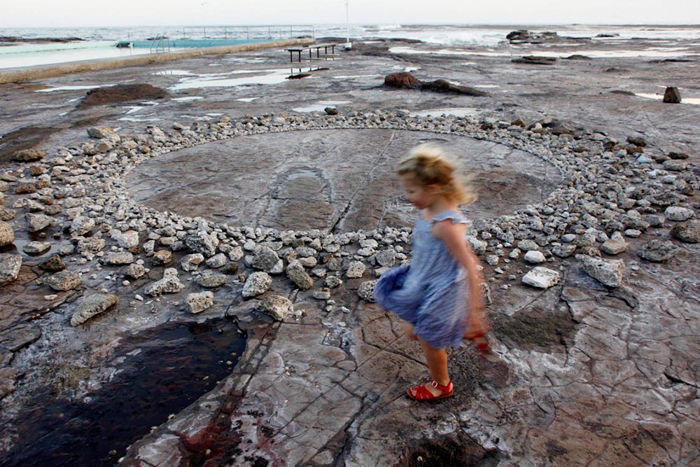 New Moon, 15 October 2012 (Hazel), sea-washed concrete, humans, approximately 6.5 metres