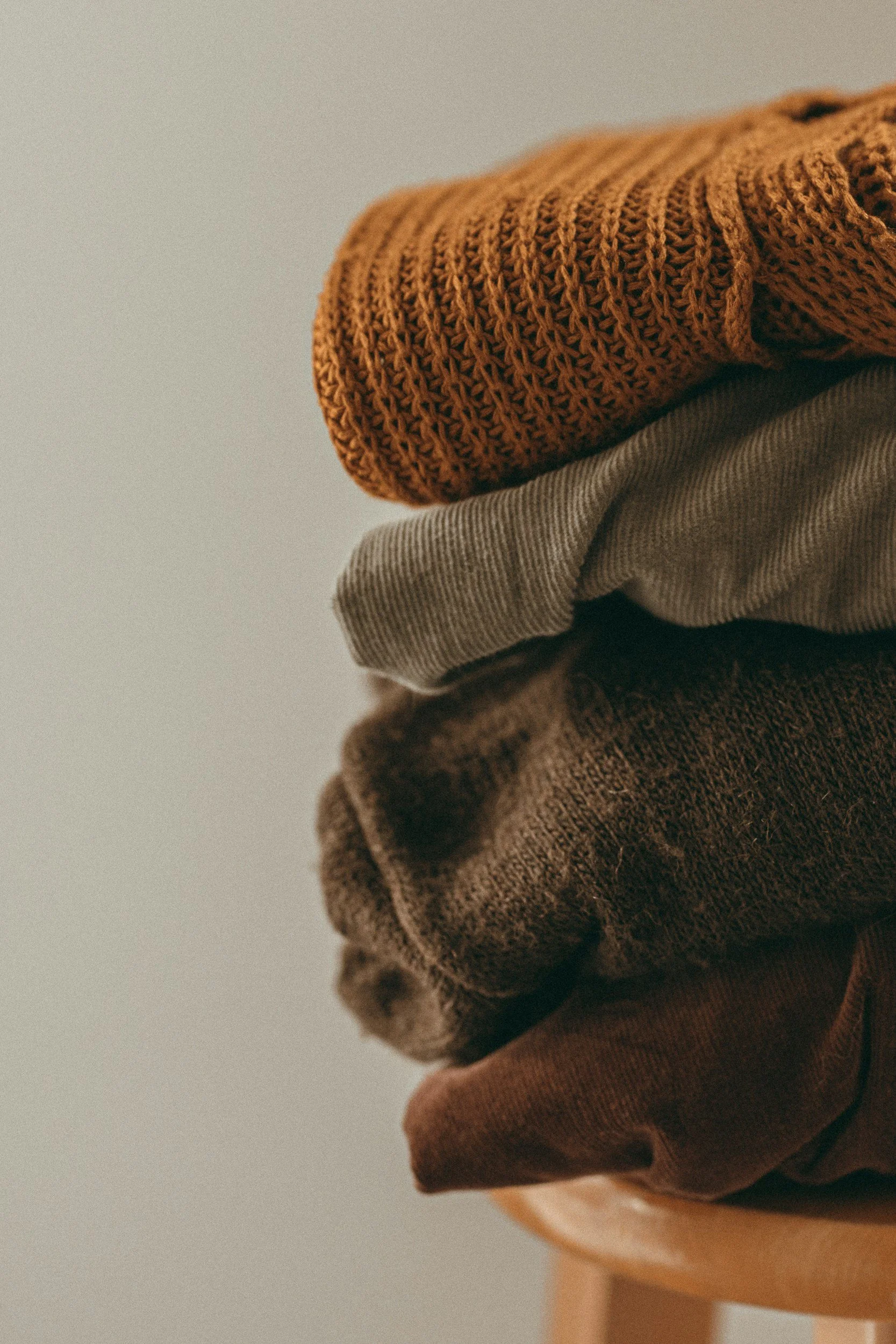 Folded stack of textural knits