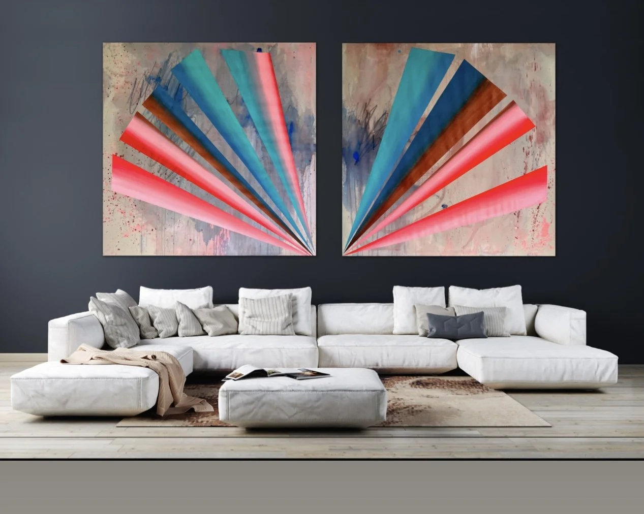 Living room with white sectional sofa, assorted pillows, and an art piece above with a dark wall background.