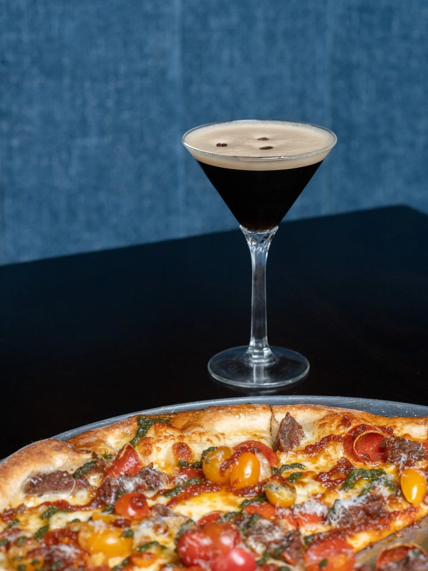 Dark. Bold. Unforgettable. 🍸

An espresso martini poured to perfection, a hand-stretched New York&ndash;style pie layered with fresh mozzarella, blistered cherry tomatoes, basil, and house sauce, this is how evenings at Society are meant to begin.

