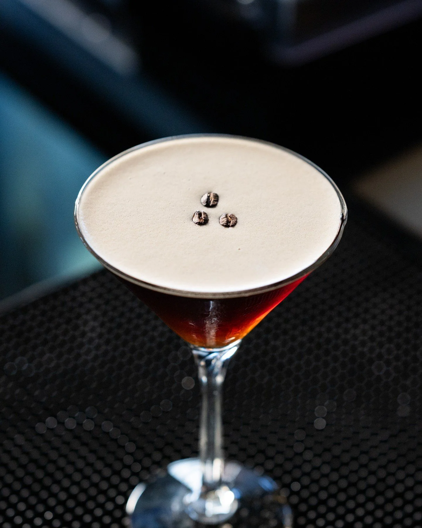 "Craft starts before the glass.

A steady shake.
A controlled pour.
Silk settling into crema.

Three beans placed with intention,
aroma, balance, finish.

No shortcuts.
No excess.

Just a cocktail built the way it should be.

Espresso martini&he