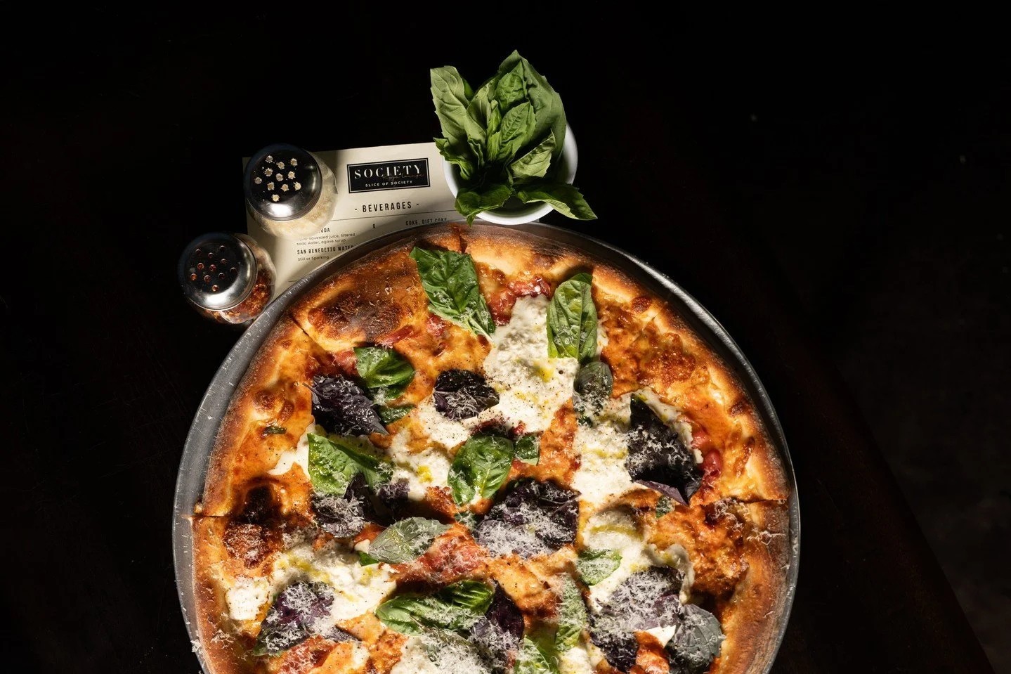 "The finish matters.

That last layer of parmesan, fresh basil placed by hand and a pie that&rsquo;s built the right way from the start, every detail is part of it.

Nothing overdone. Nothing extra. Just clean ingredients and execution you can s