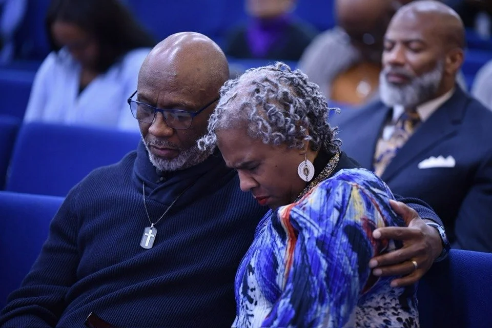 James and Carletta praying