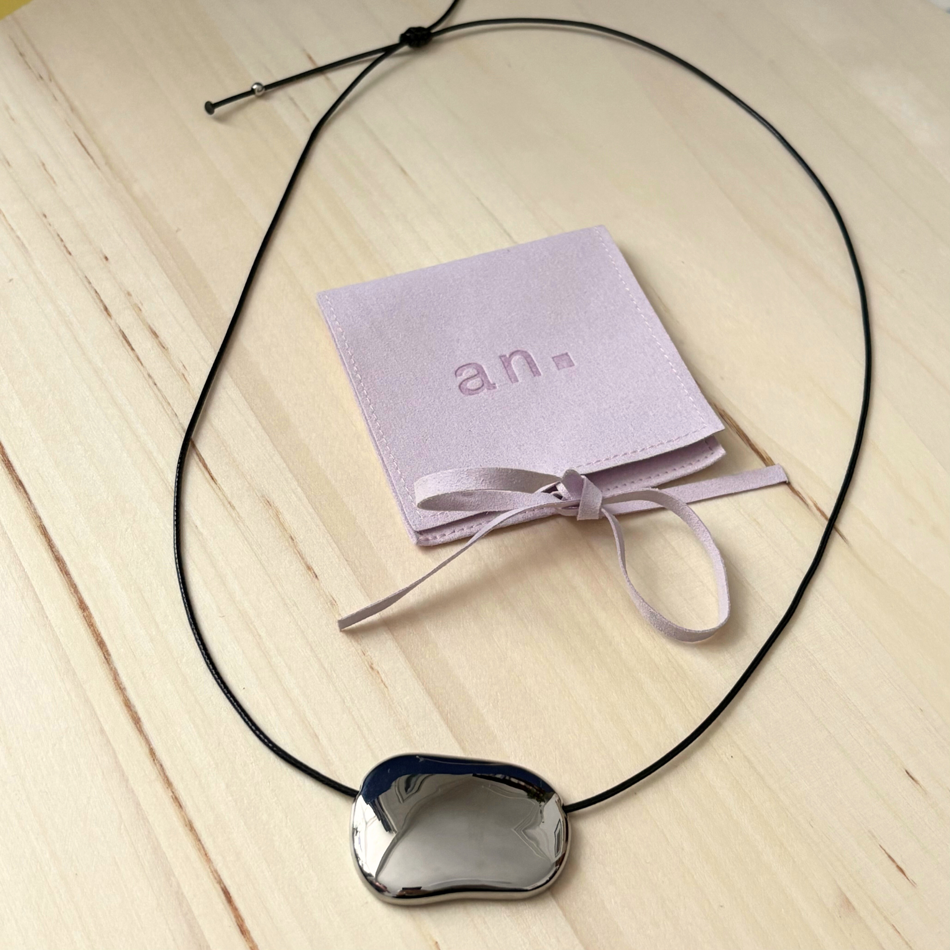 About November Clo Cord Necklace with bag