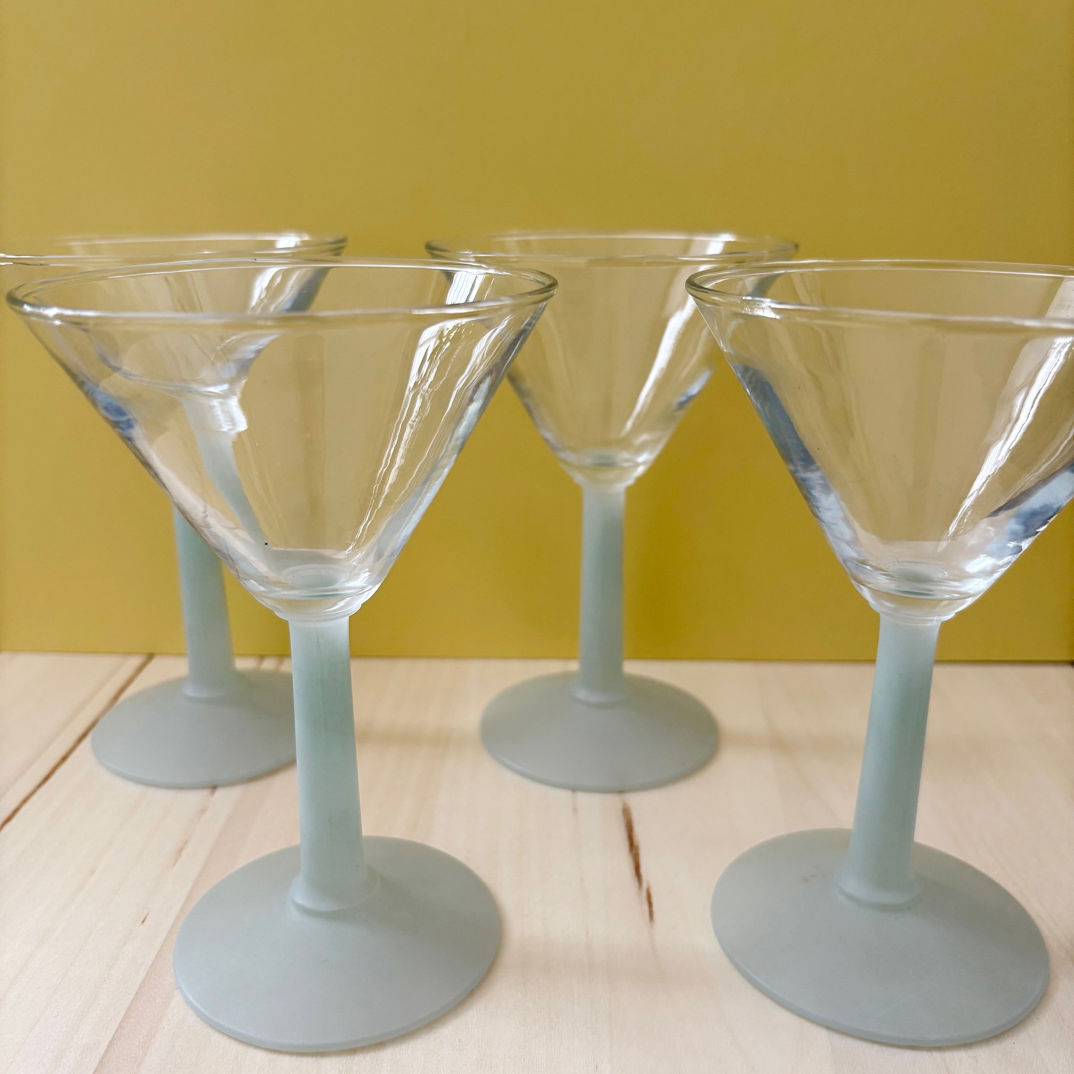 Four preloved cocktail glasses