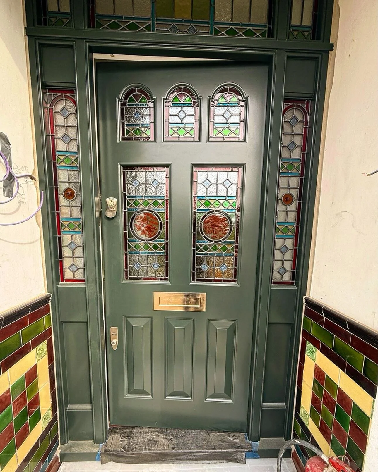 Beautiful new front door now in at our Merton project. So satisfying to see great craftsmanship going into all aspects of a project. The stained glass was the original front door stained glass but has been matched in panels and refurbished before bei