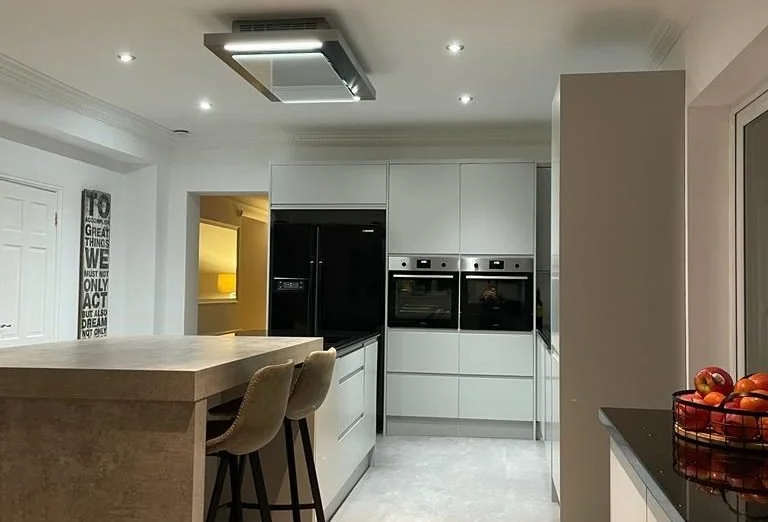 Kitchen and dining extension with modern cabinetry and skylight lighting