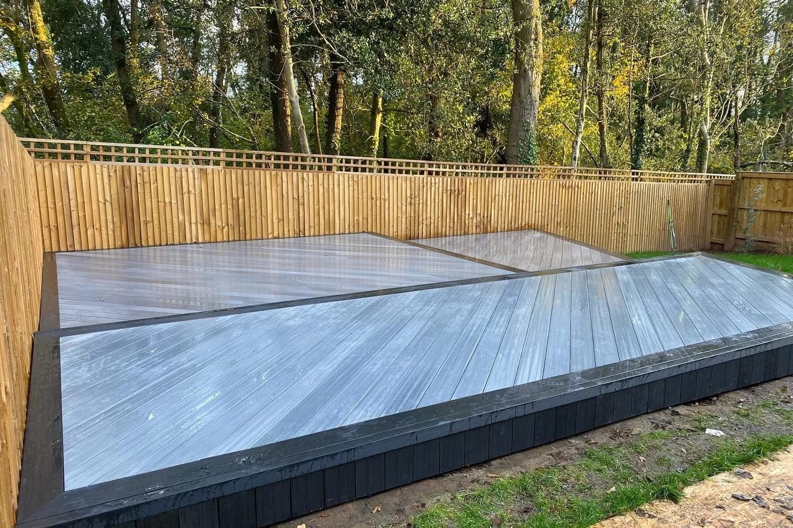 Exterior carpentry including decking and fencing for new build