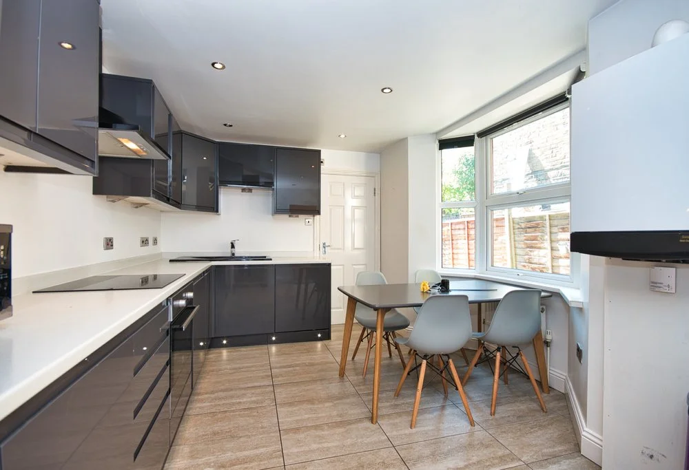 Modern kitchen extension with breakfast bar and seating area