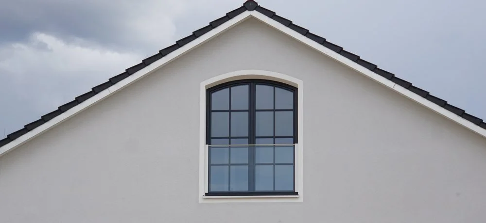 Hip to gable loft conversion with extended wall and window