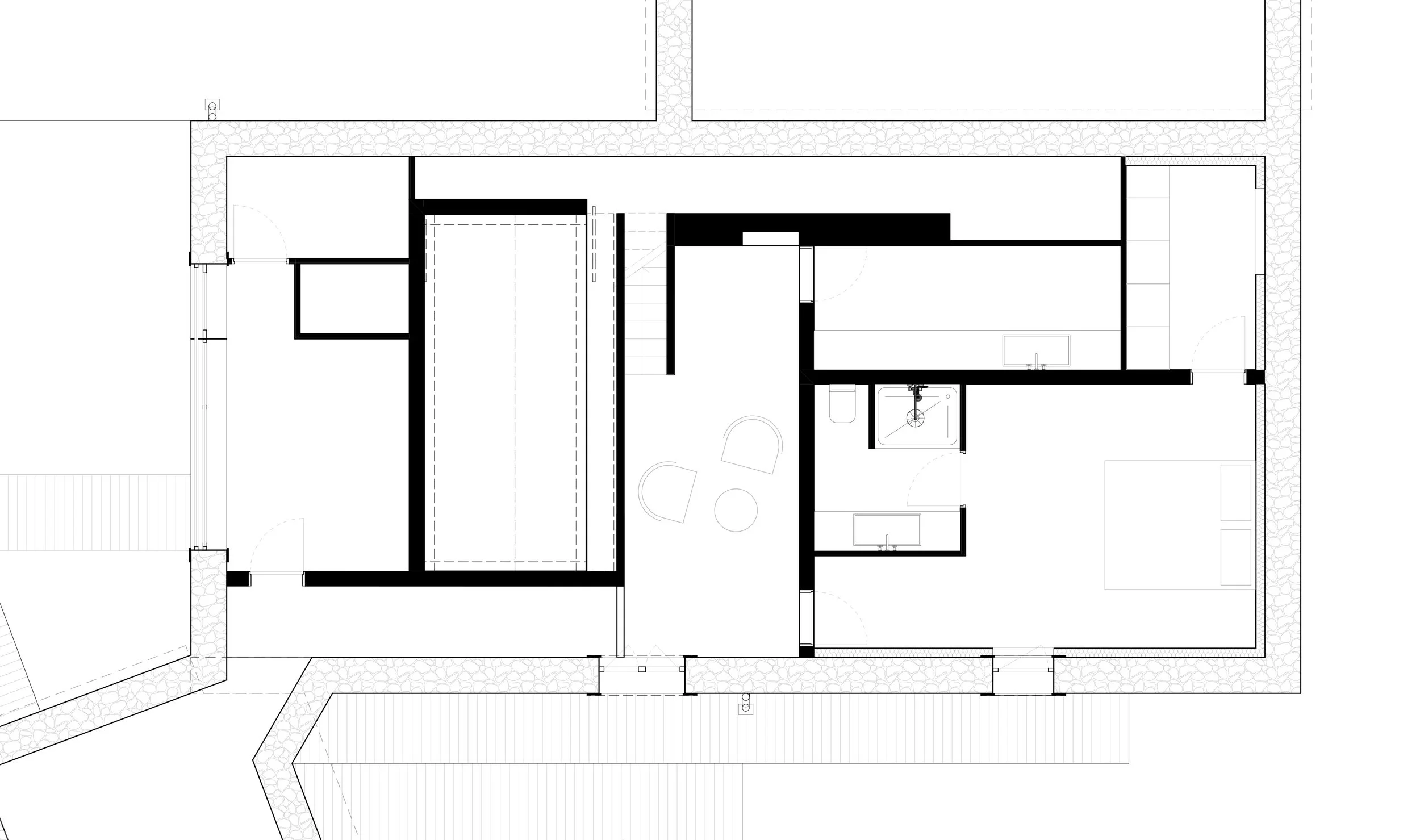 Plan architectural d'une maison avec plusieurs pièces, y compris une salle de bains, une cuisine, et une salle de séjour.