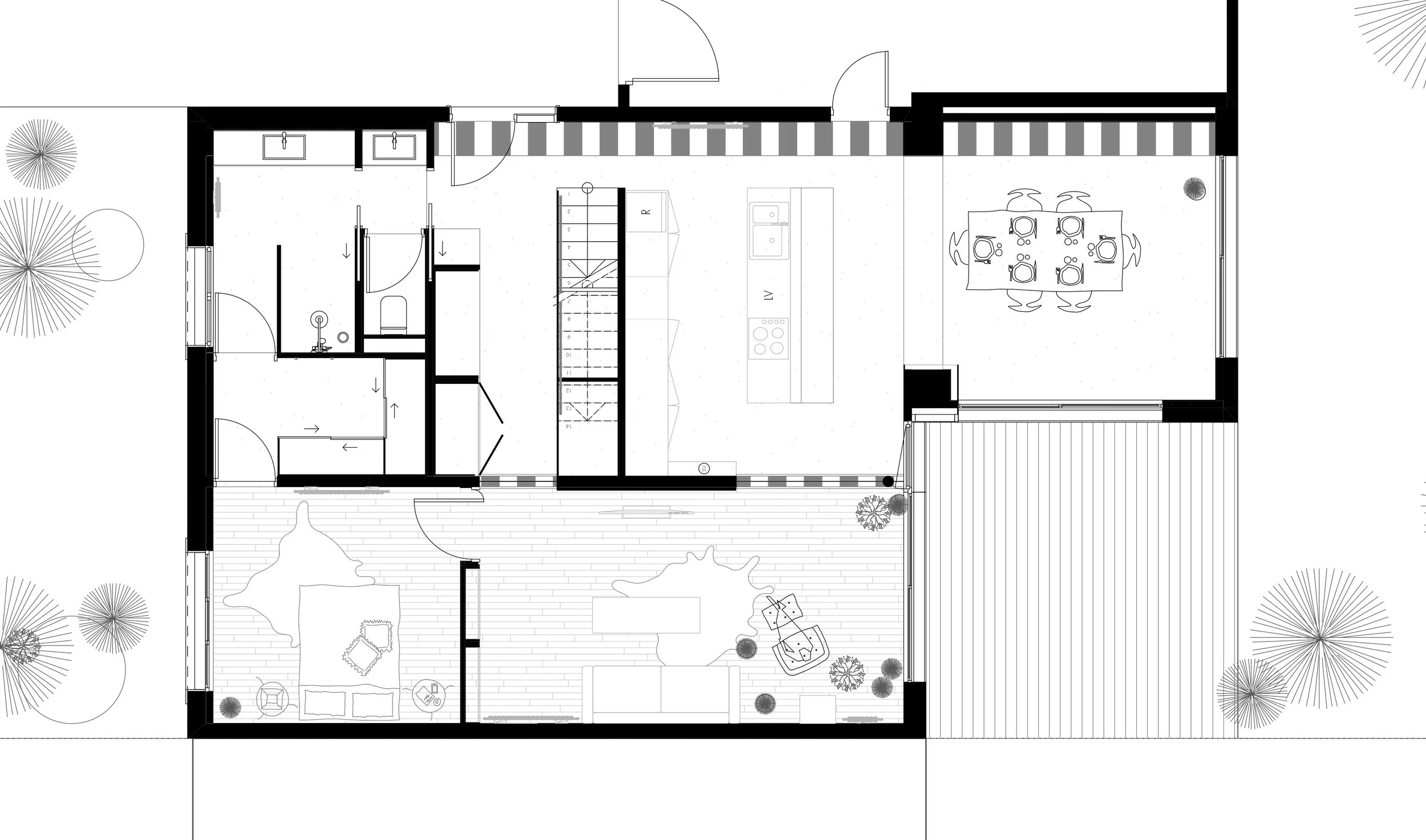 Plan architectural d'une maison résidentielle, montrant plusieurs pièces, une cuisine, une salle à manger, une chambre à coucher, et un espace extérieur avec des arbres.