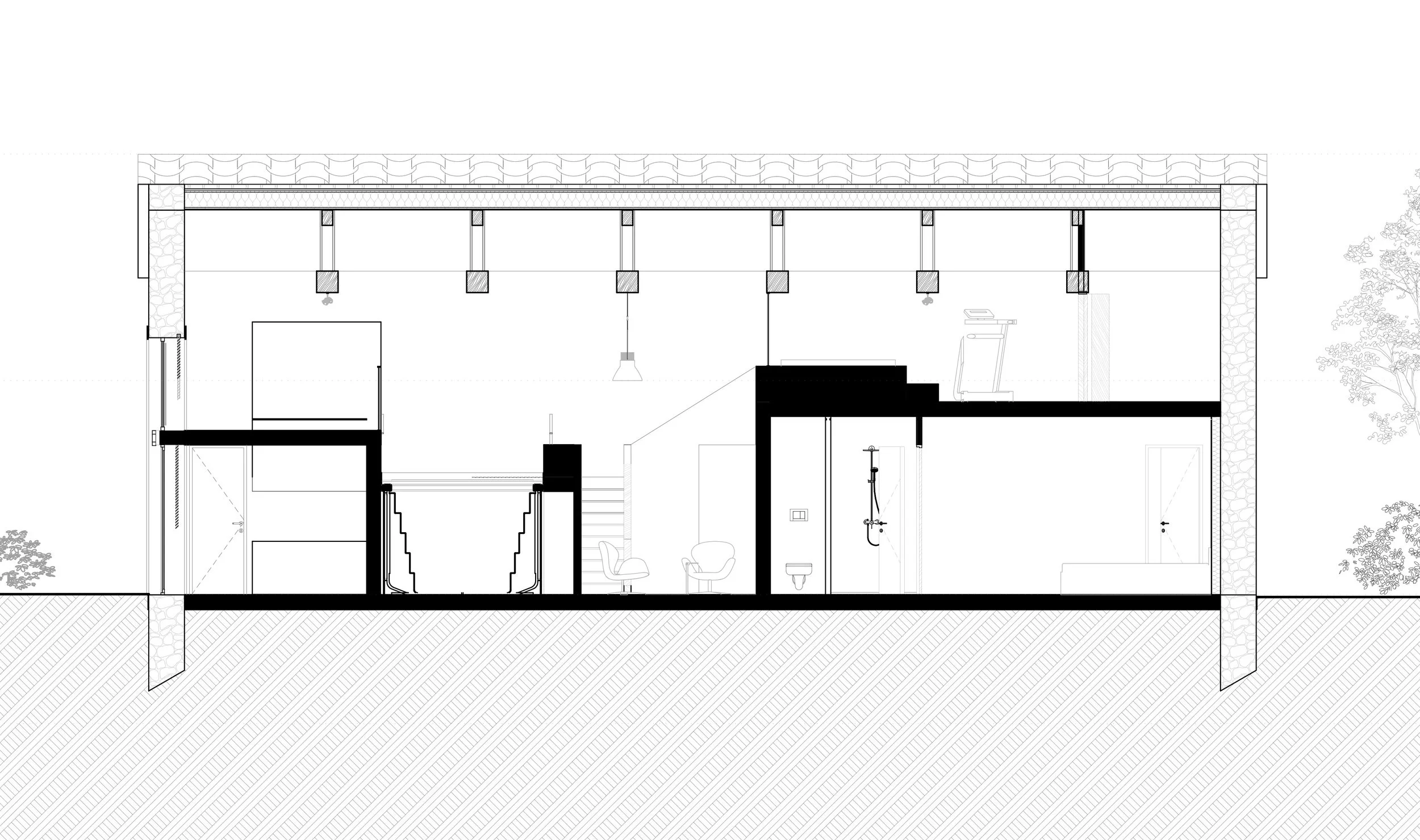Plan architectural d'une section d'une maison avec différentes pièces, escaliers, éléments de plomberie, et mobilier minimaliste.