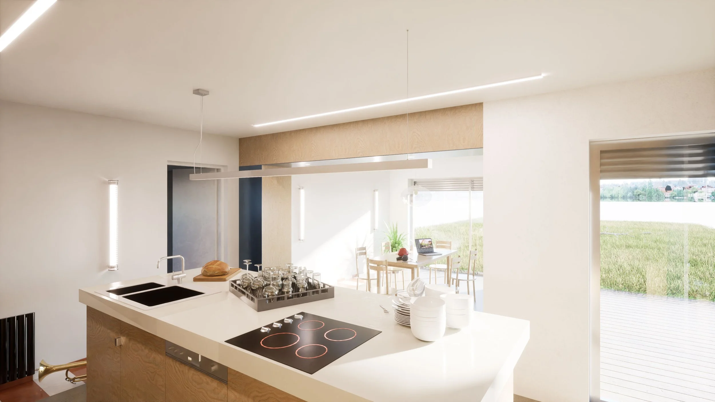 Cuisine moderne avec un plan de travail blanc, plaques de cuisson électriques, et des ustensiles de cuisine. Grande fenêtre laissant entrer de la lumière naturelle, vue sur un extérieur vert.