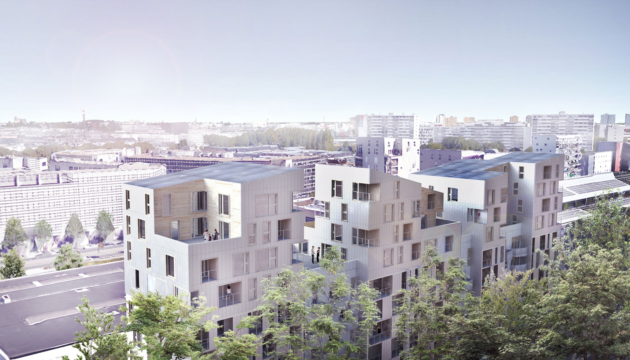 Un groupe de bâtiments résidentiels modernes avec des terrasses et des fenêtres, entourés d'arbres, dans une ville avec un horizon urbain.