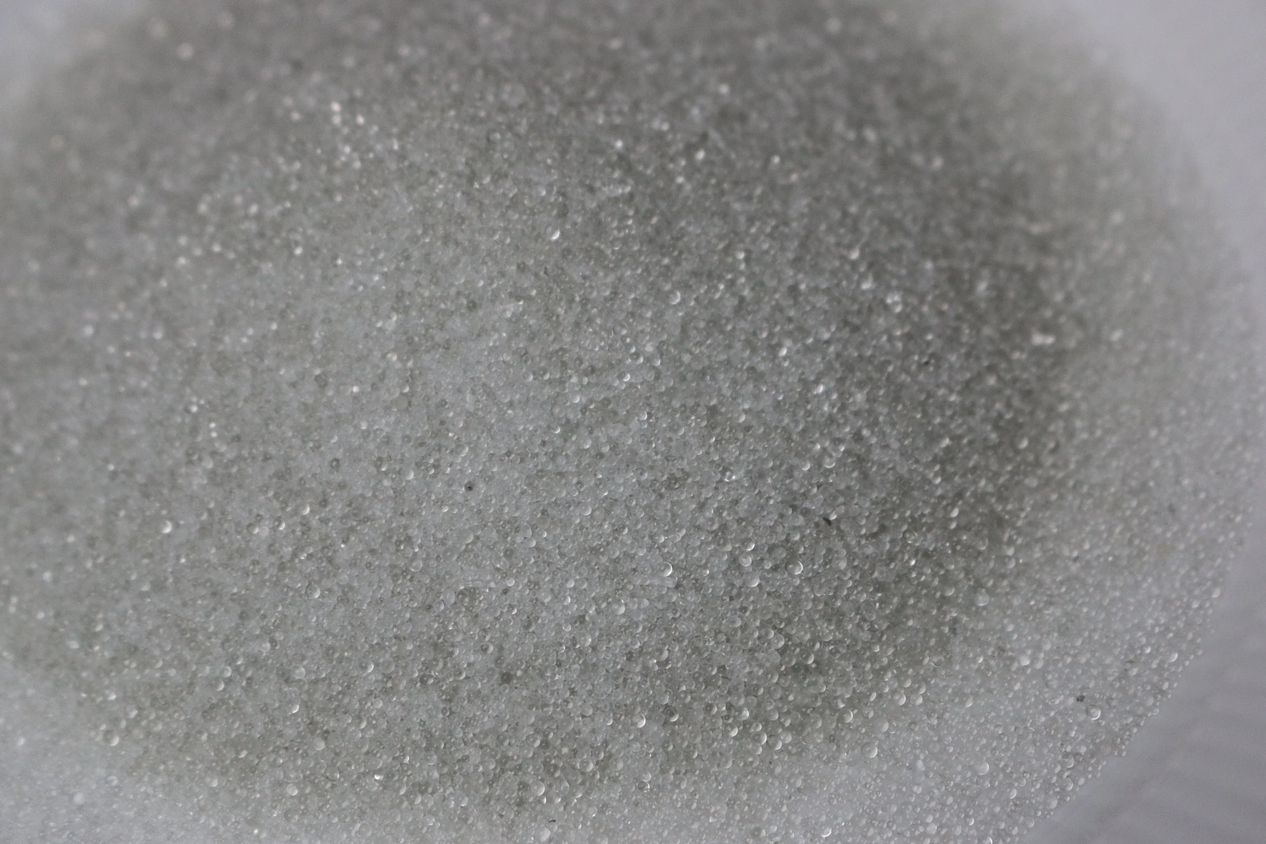 Close-up of a surface of micro glass beads used for weighted garments.