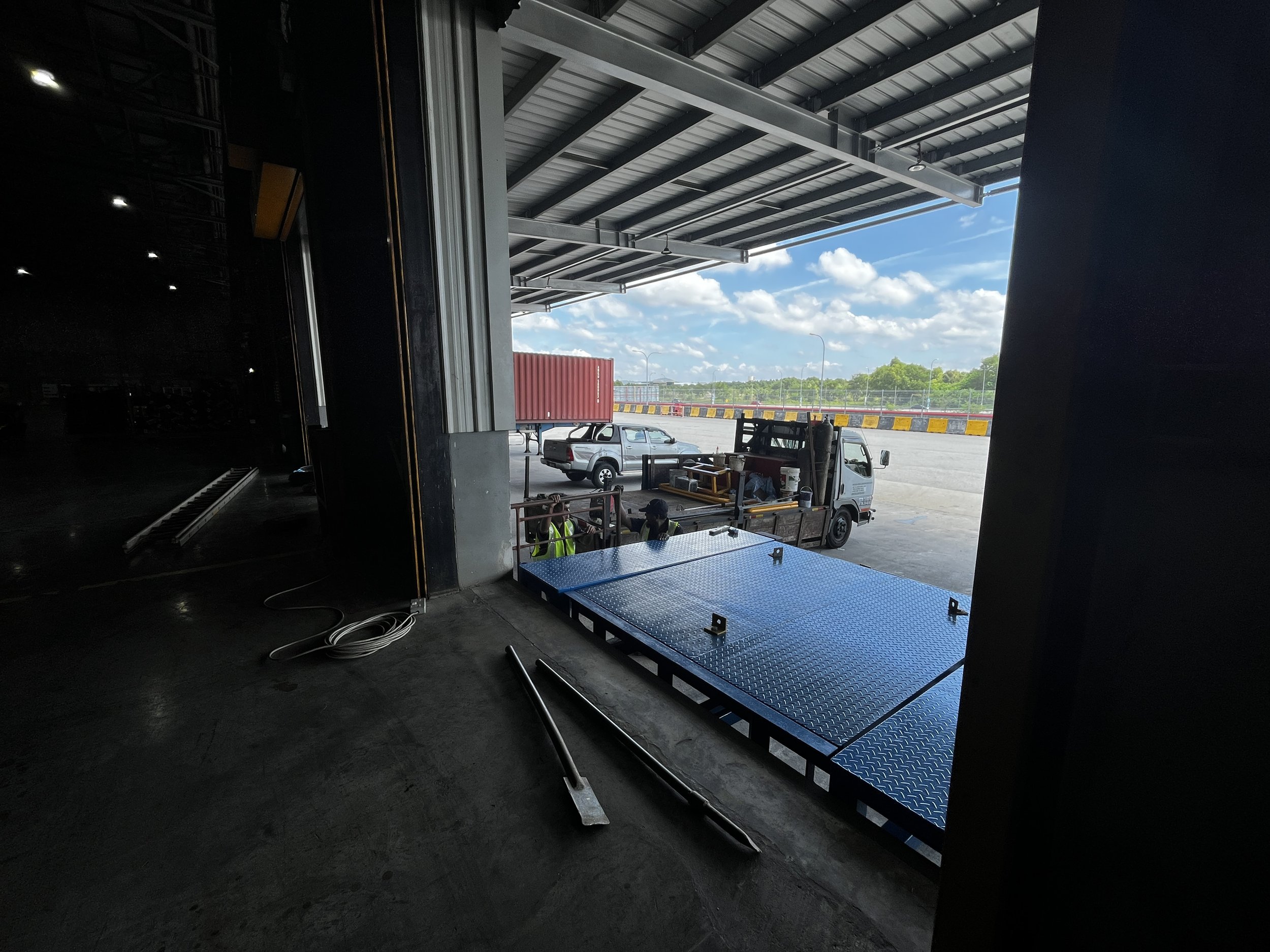 Hydraulic dock leveller at Malaysian distribution centre loading dock.