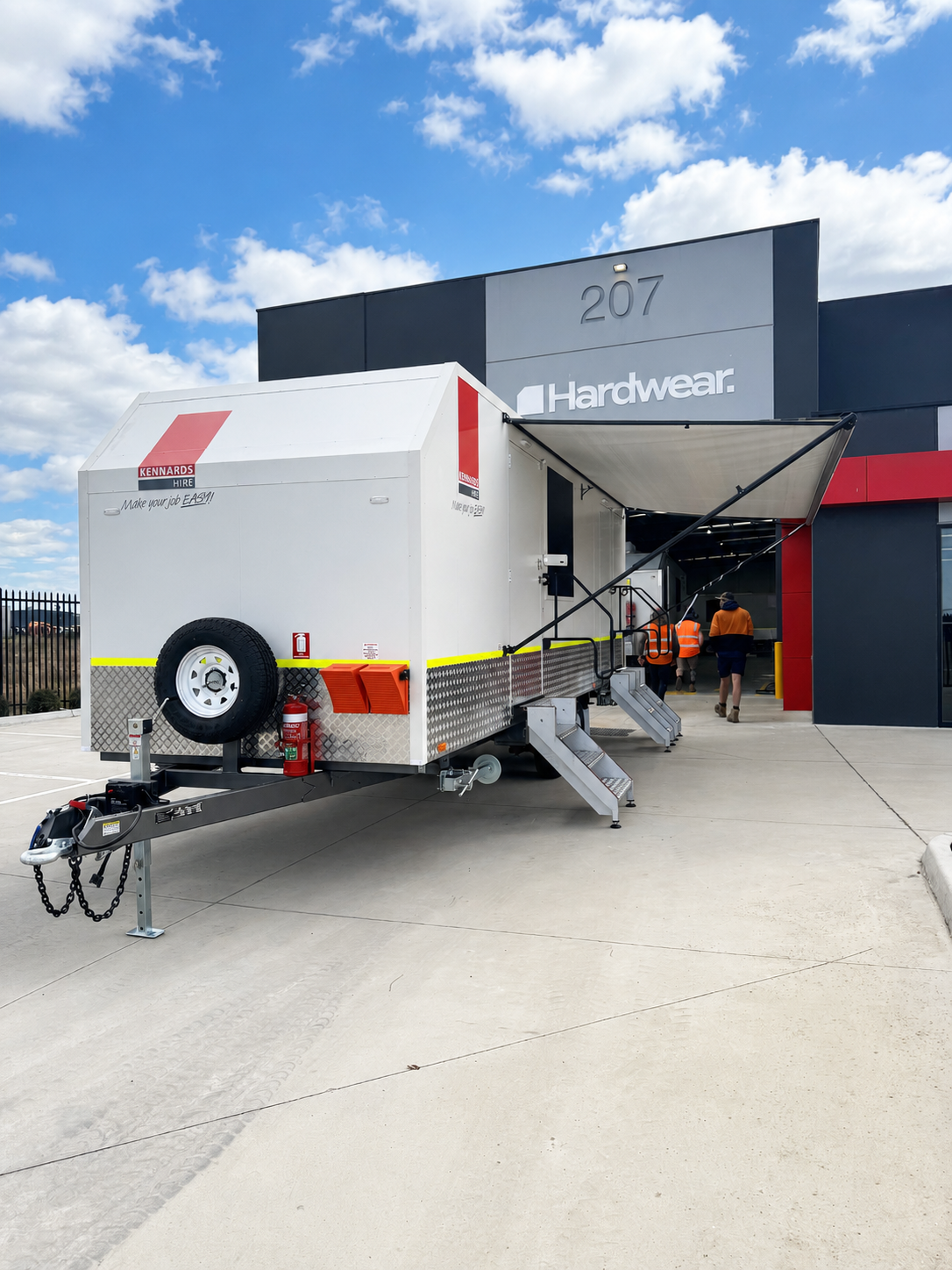 Hardwear compact onsite van parked at commercial premises, white towable mobile site office unit, Australia