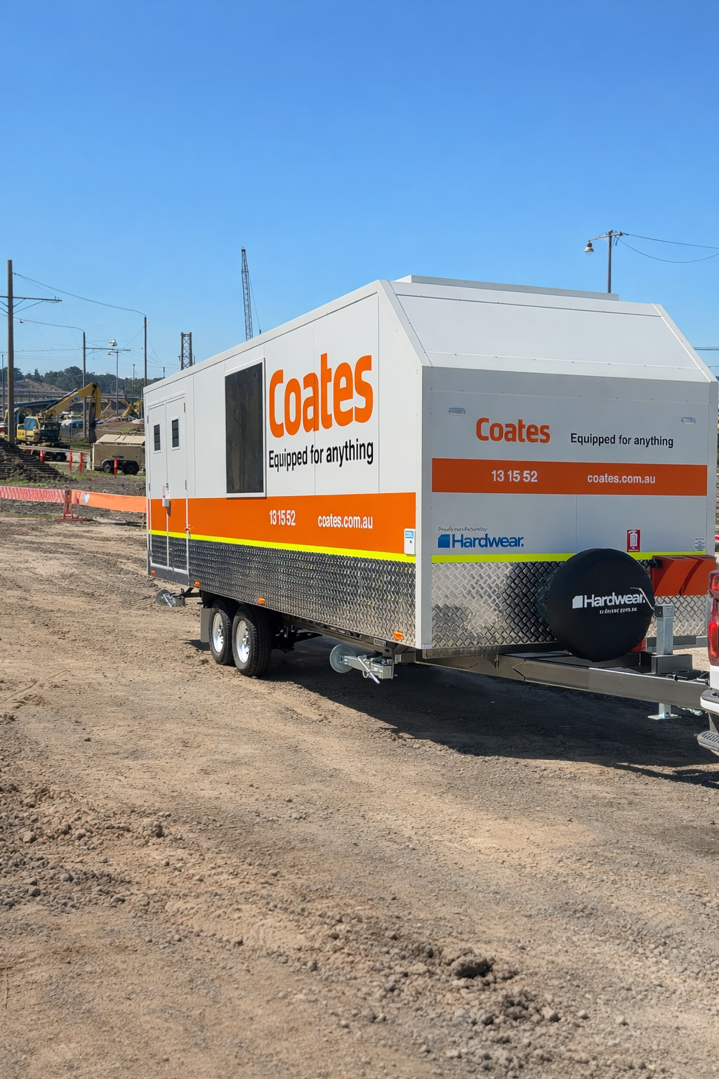 Coates trailer on construction site.png