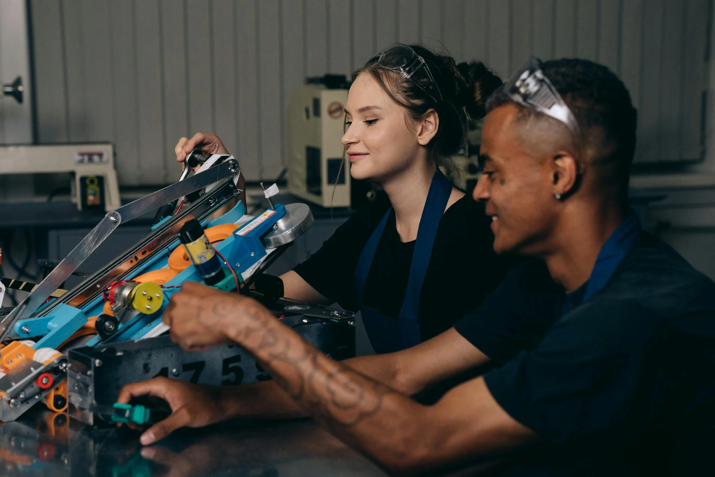 Two young engineers working on a new project.