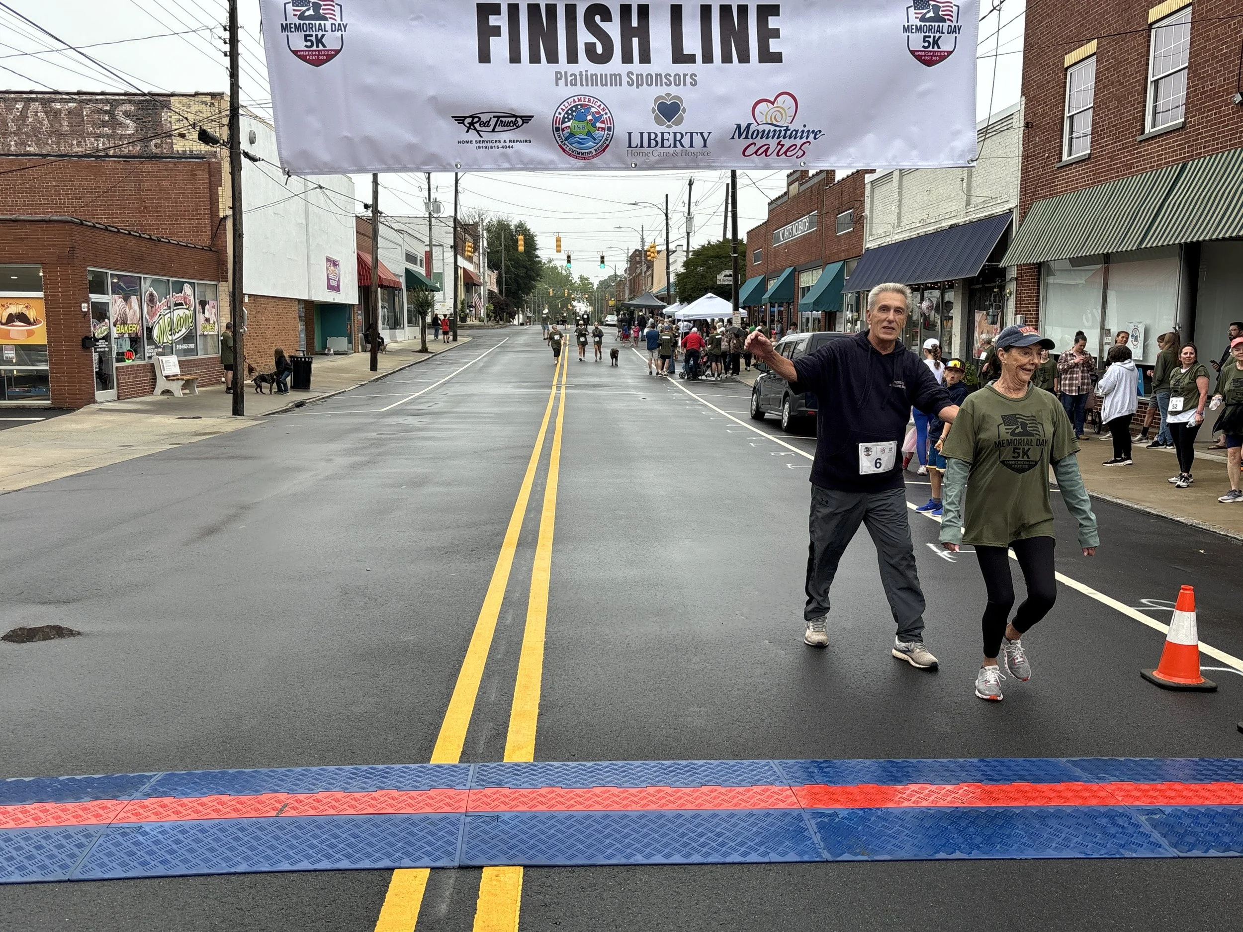 Snow Camp Post 305 Members crossing the line