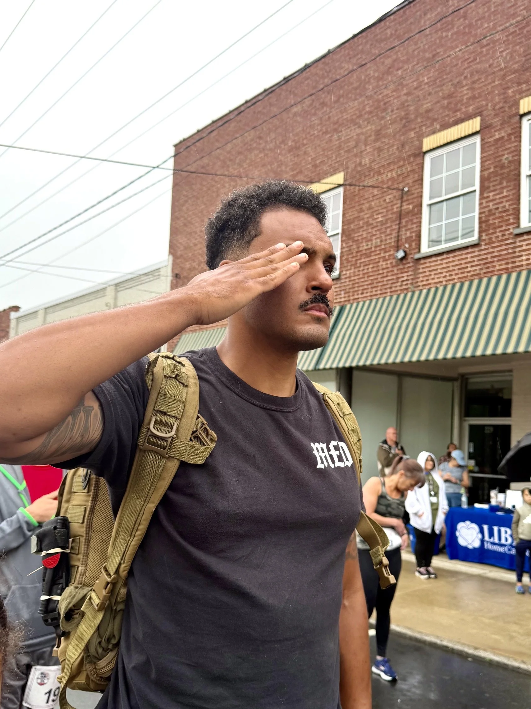 Rendering a salute during the singing of the National Anthem