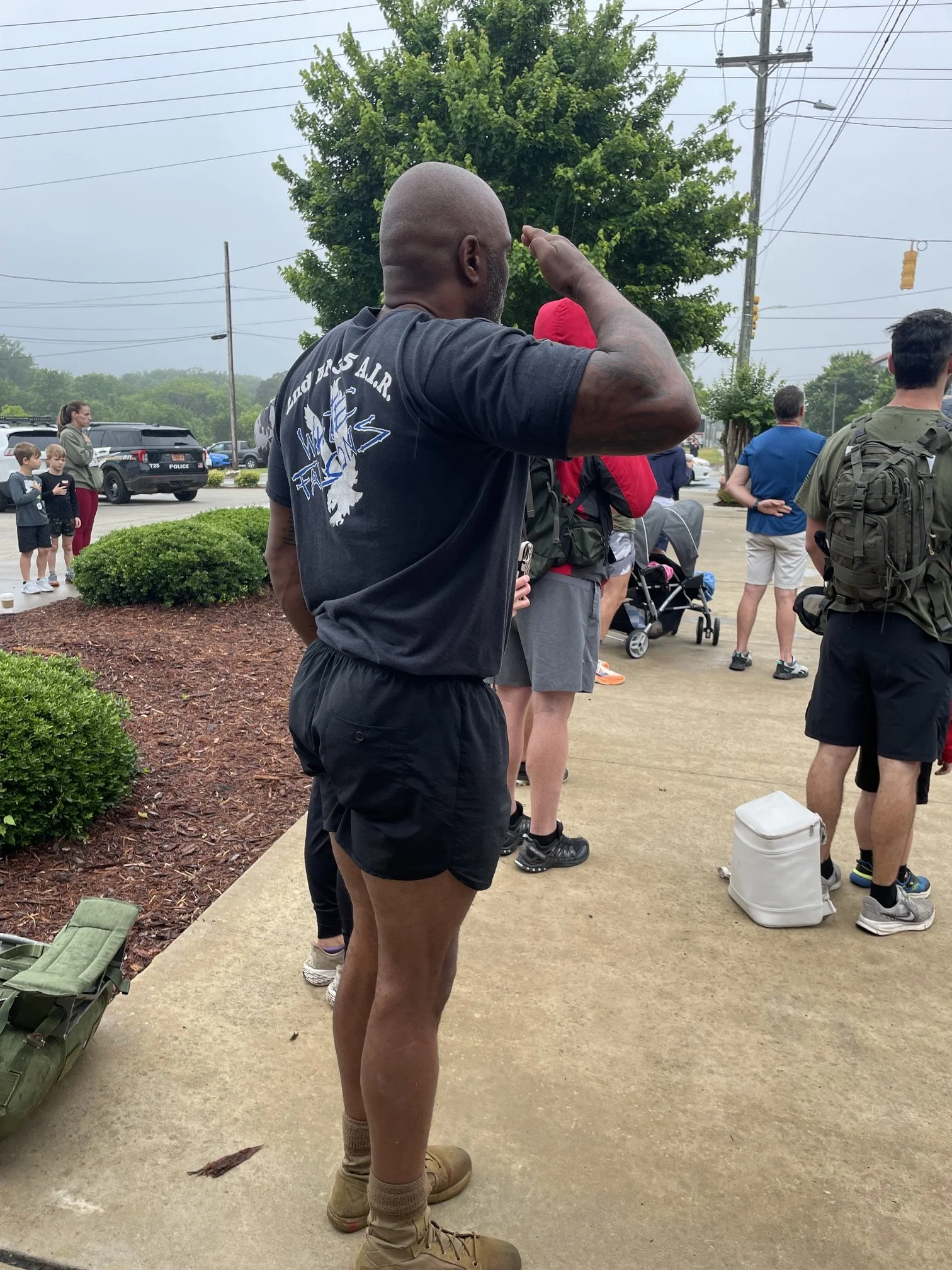 Rendering a salute during the singing of the National Anthem