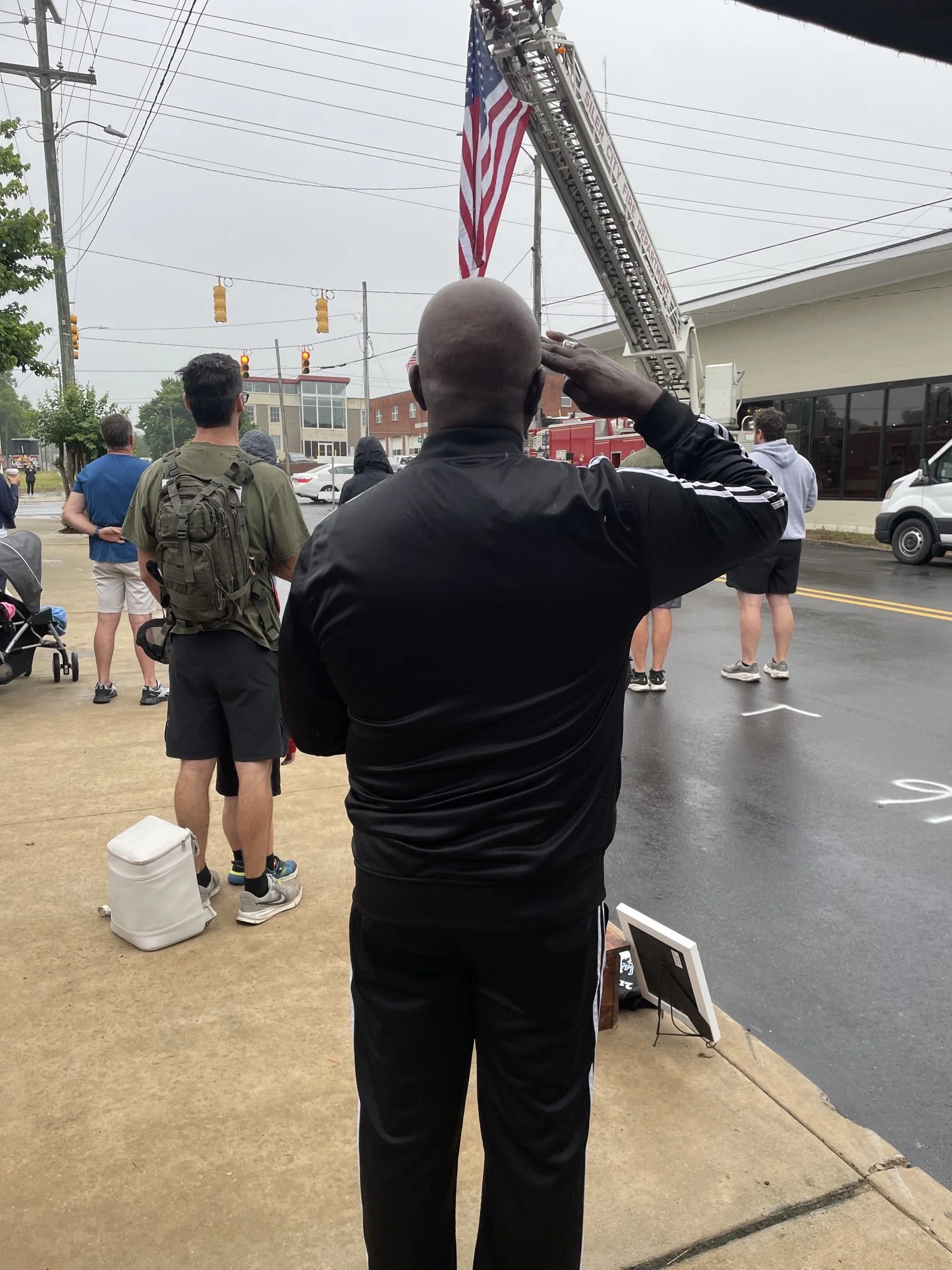Rendering a salute during the singing of the National Anthem