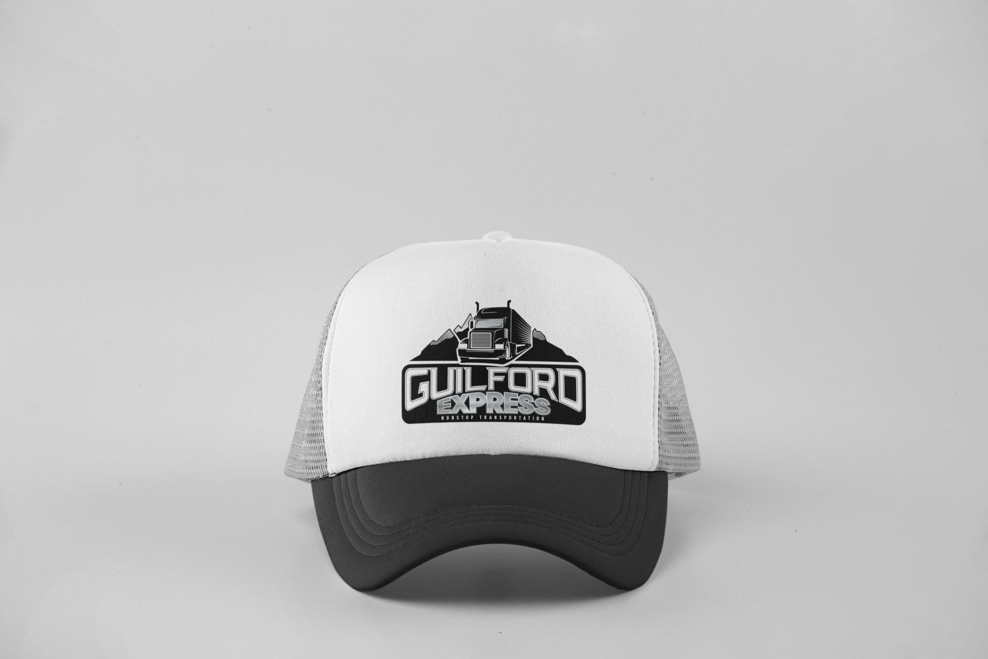 mockup-of-a-single-trucker-hat-with-a-customizable-background-11705.png