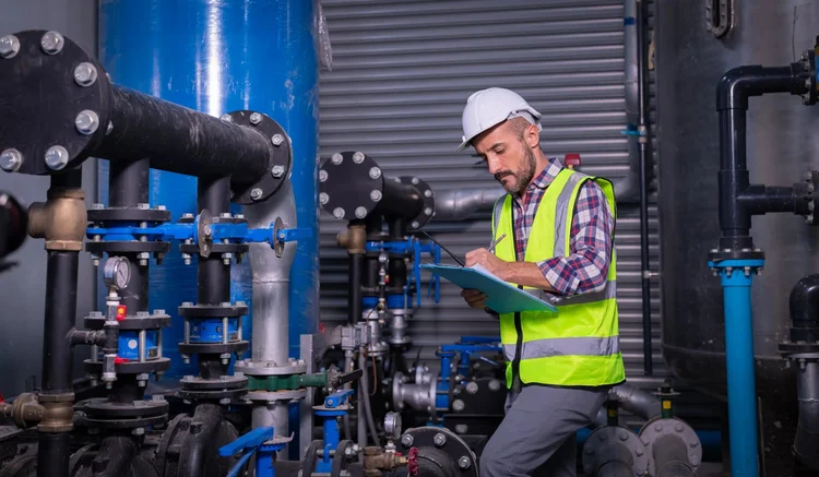 Engineer carrying out a Legionella risk assessment