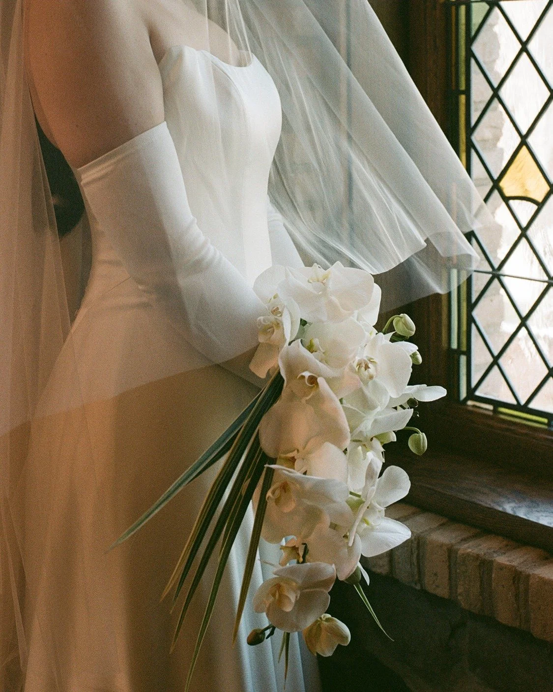 Phalaenopsis Orchid Bouquet in Classic White 
Venue: @thelittlechapel 
Photographer: @madynoelphoto
Planner: @theintent_