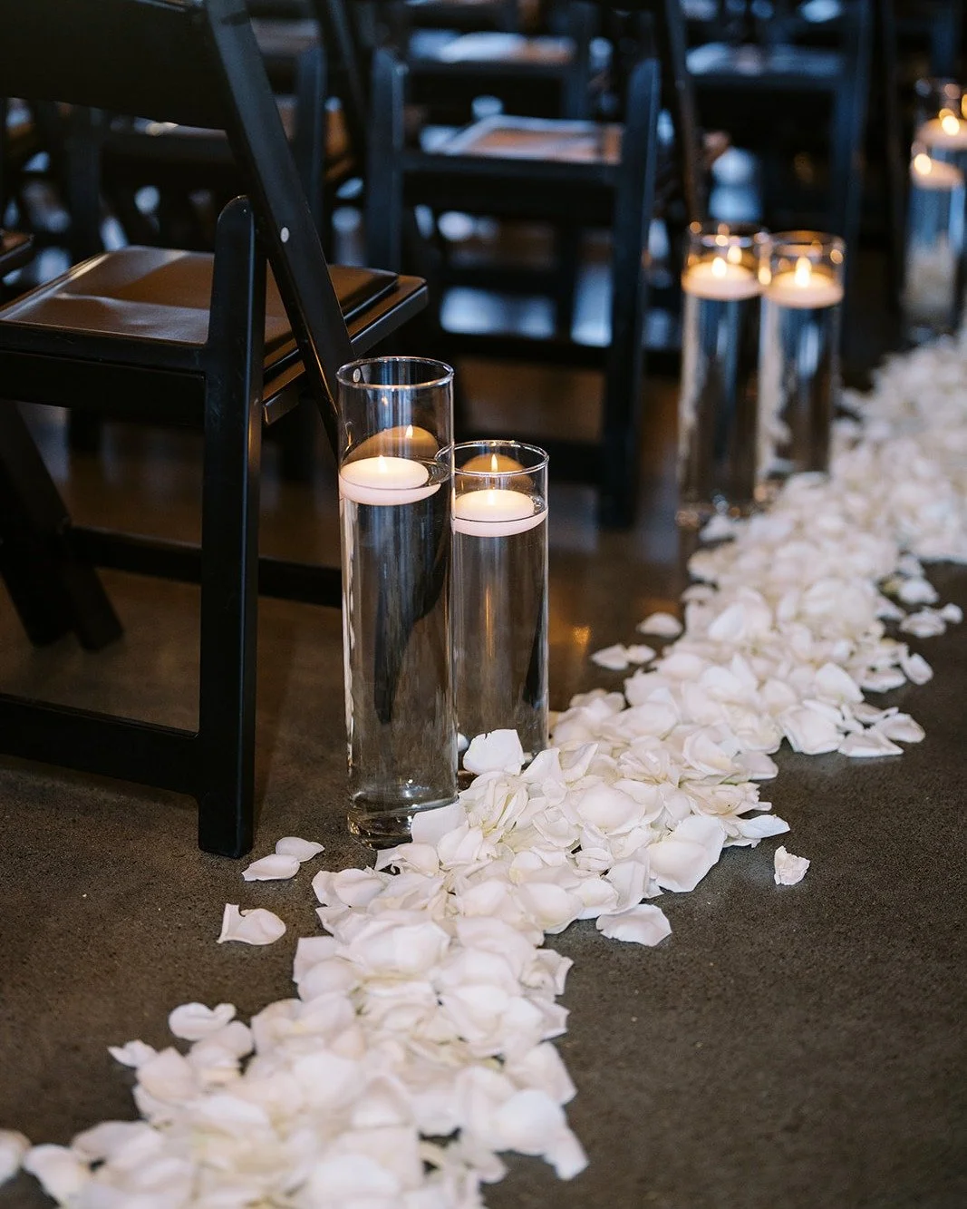 Candlelight and rose petals for the ultimate aisle statement piece. 
@childresswines