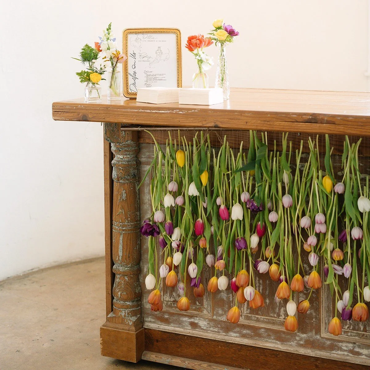 This tulip install on the front of the bar was so refreshing to make. It went all the way across and added a real wow factor to the silo at the Barn at Reynolda.