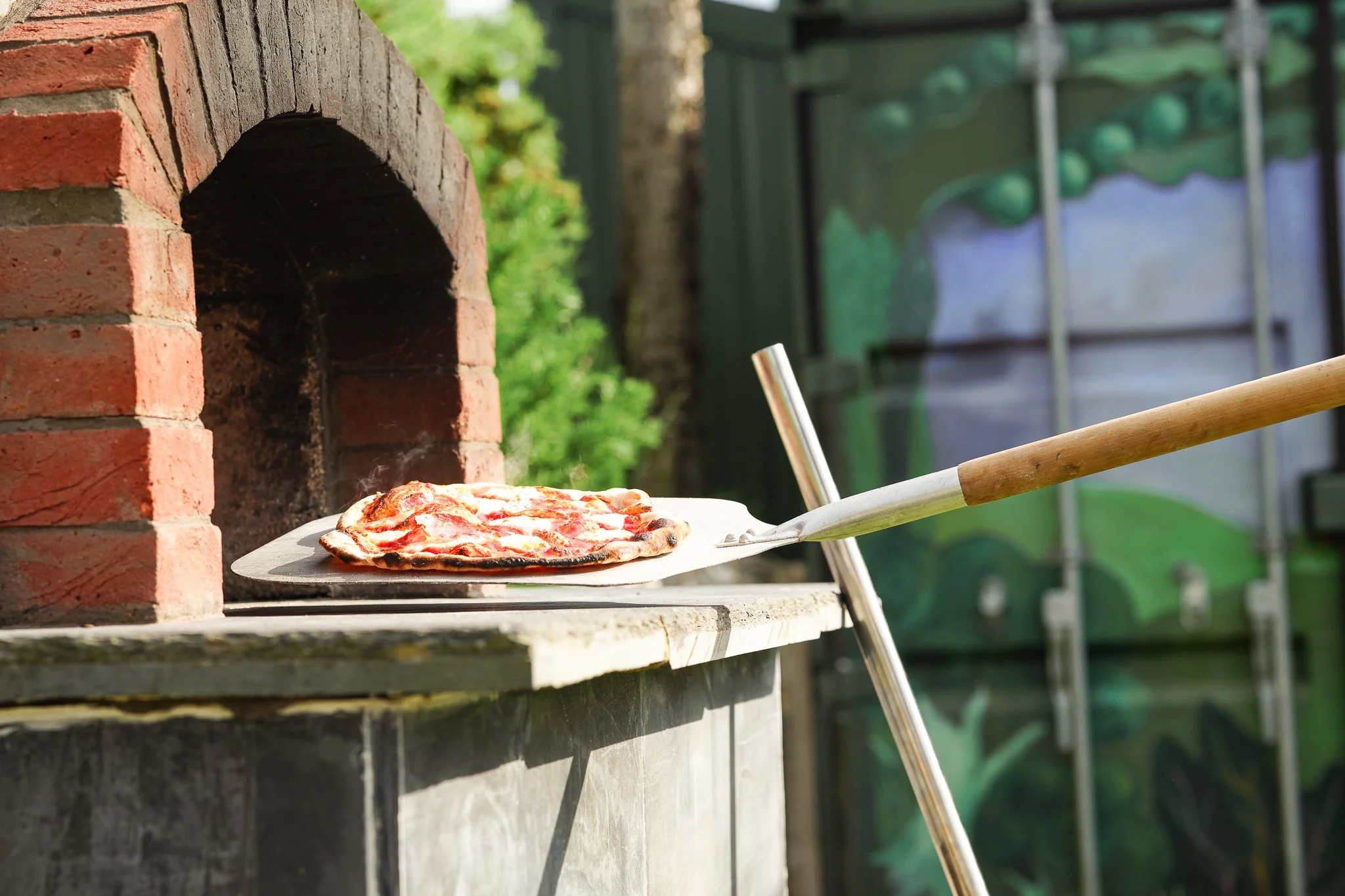 Fire up the wood fired pizza oven for a proper evening.
