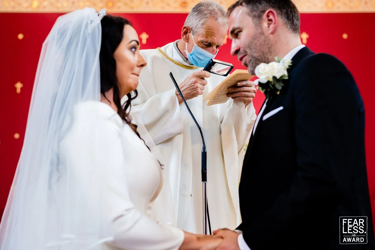 Fun modern wedding photography of moments during the wedding ceremony captured by Dublin wedding photographer Annie Kheffache