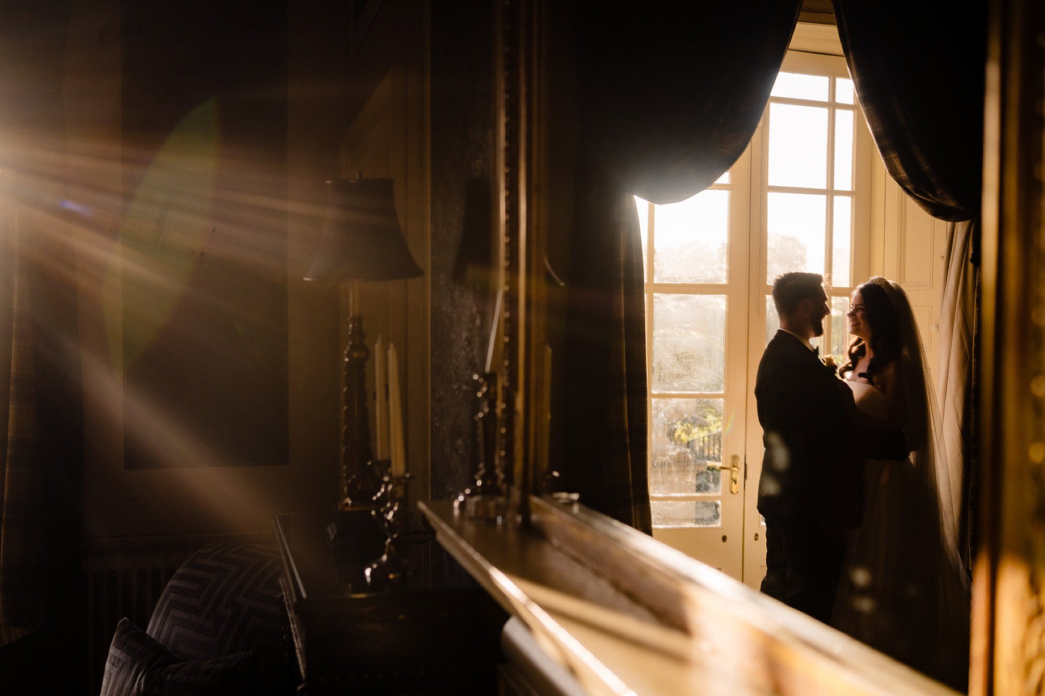 gloden light and a reflection in tankardstown house in meath