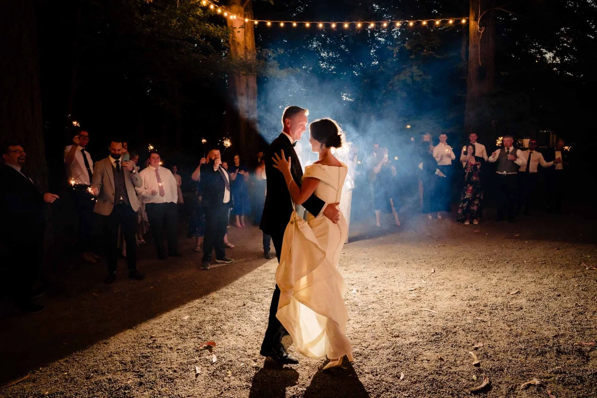 wedding photo of couple having their first dance outdoors in tinakilly house
