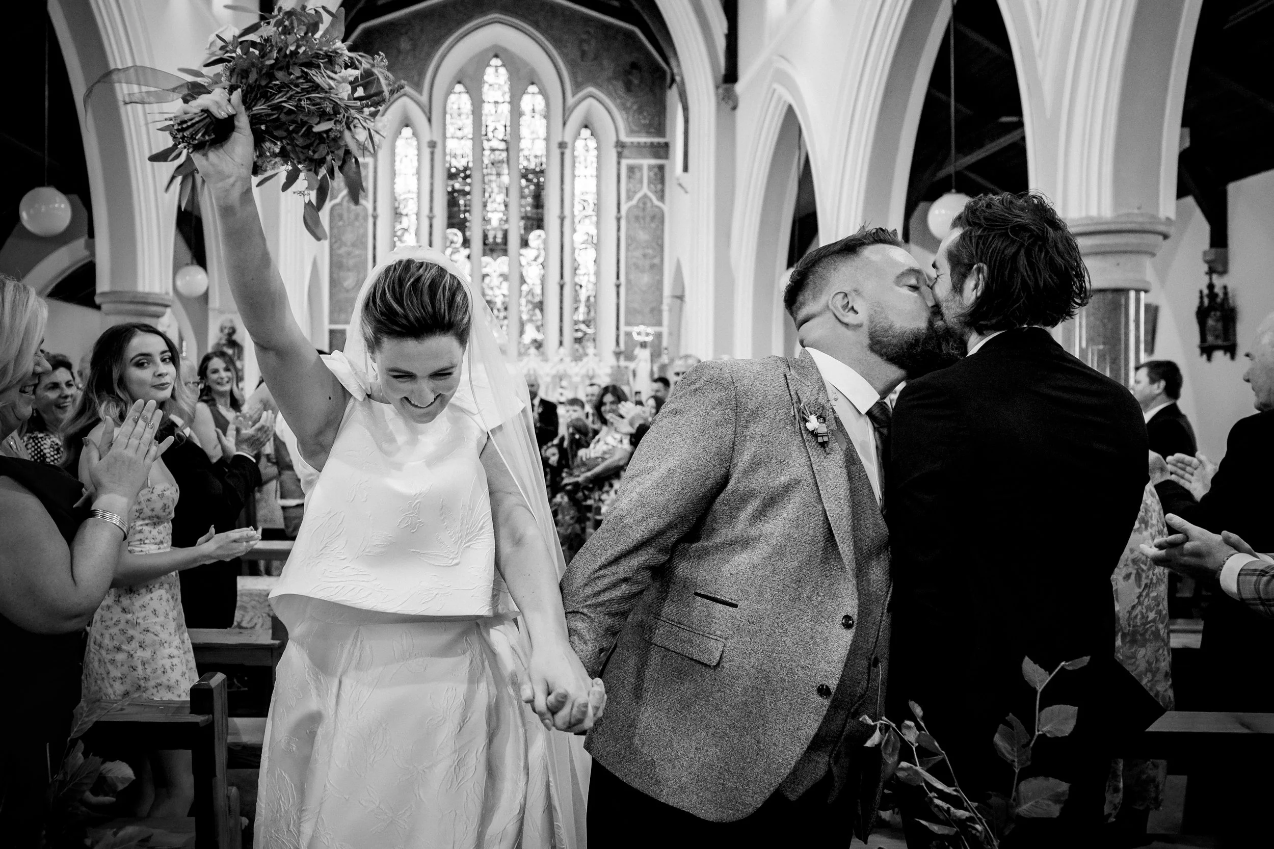 A couple celebrates their wedding ceremony in Dublin Ireland in an elegant documentary wedding photograph by Annie Kheffache