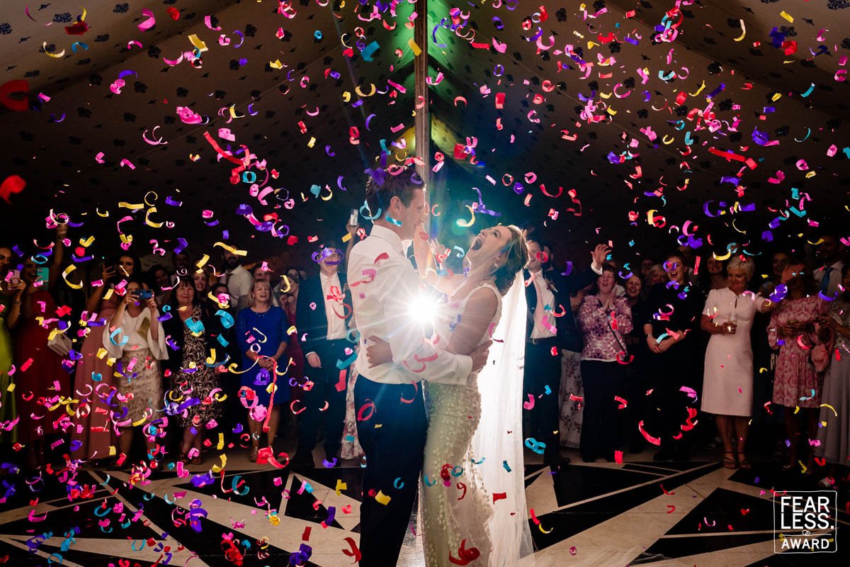 A wedding photographer captures confetti on the dancefloor for the first dance at a Dublin wedding