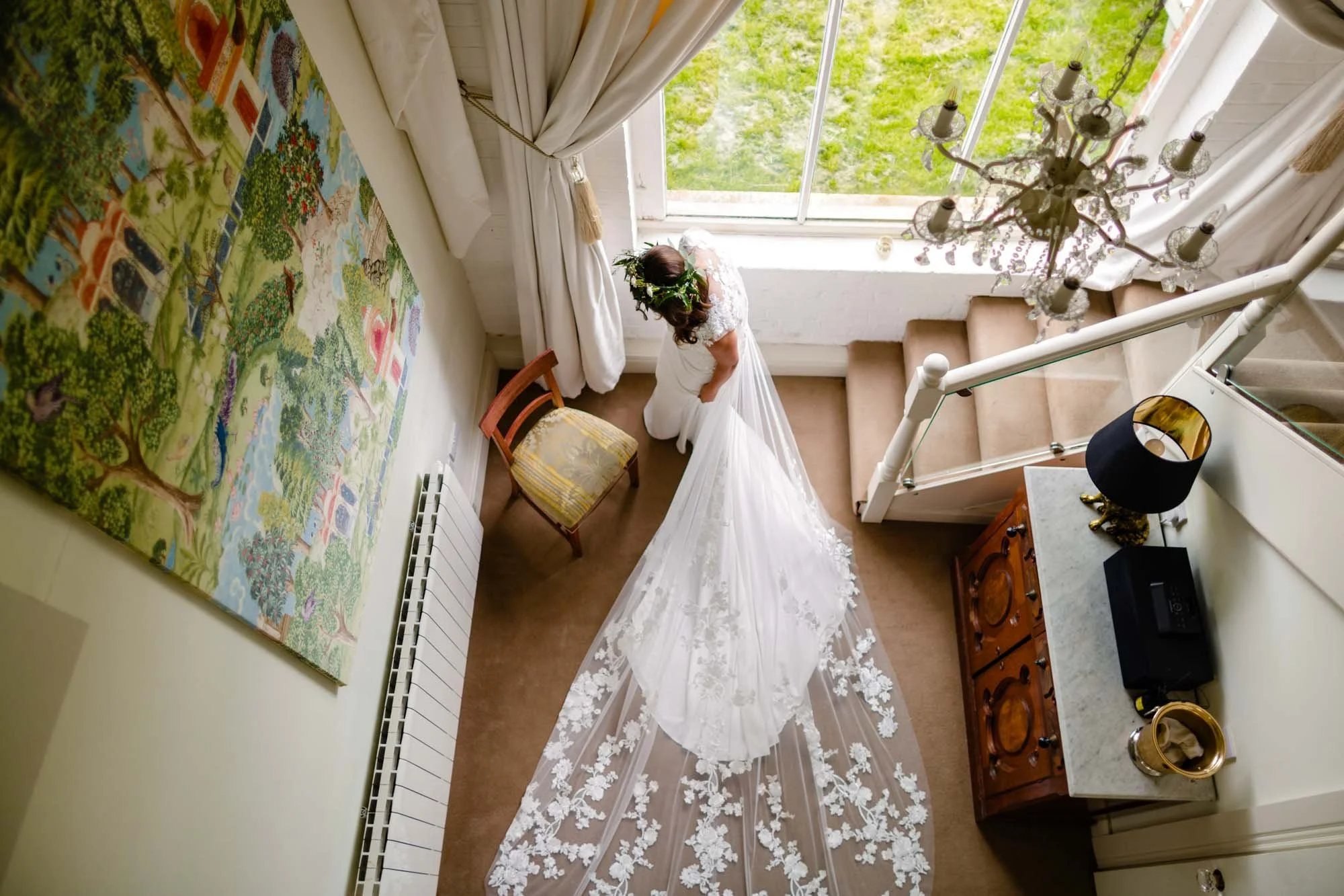A portrait of the bride in the bridal suite at The Millhouse Slane taken from above by Annie Kheffache