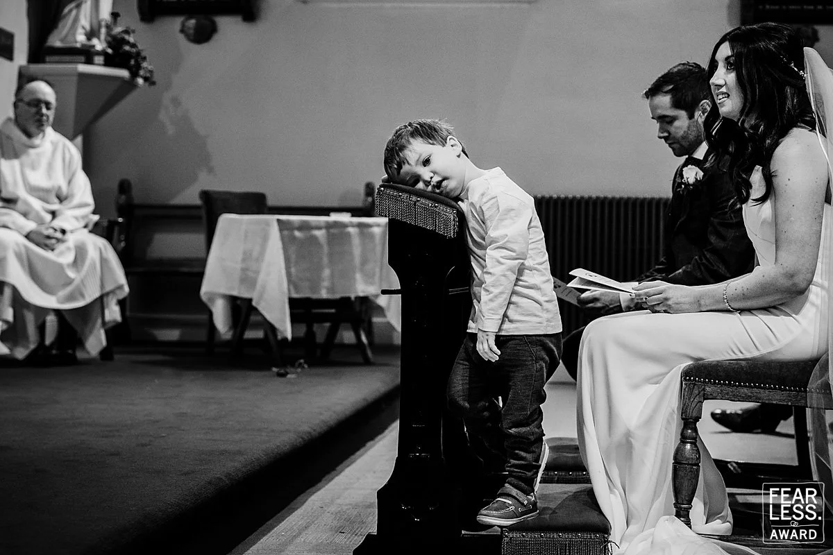 Kids at weddings funny moment wedding photography at a Dublin wedding ceremony