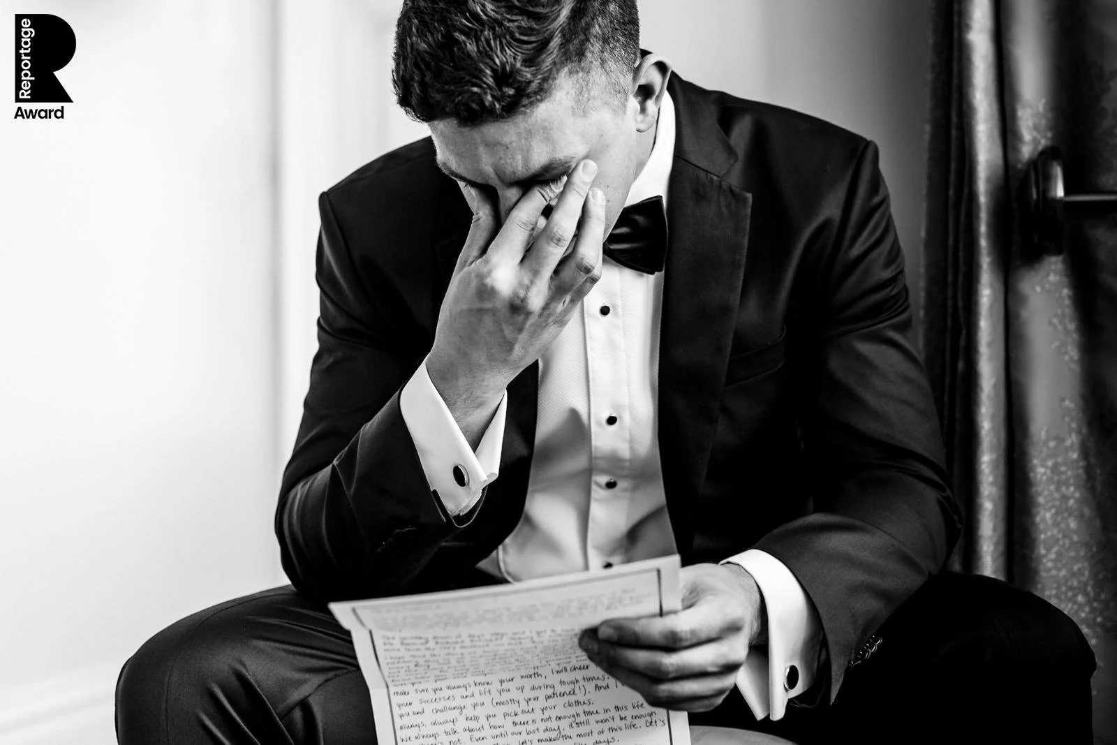 Emotional American groom reading a letting from his bride before his destination wedding in Ireland at Wilton Castle recording in award winning wedding photography