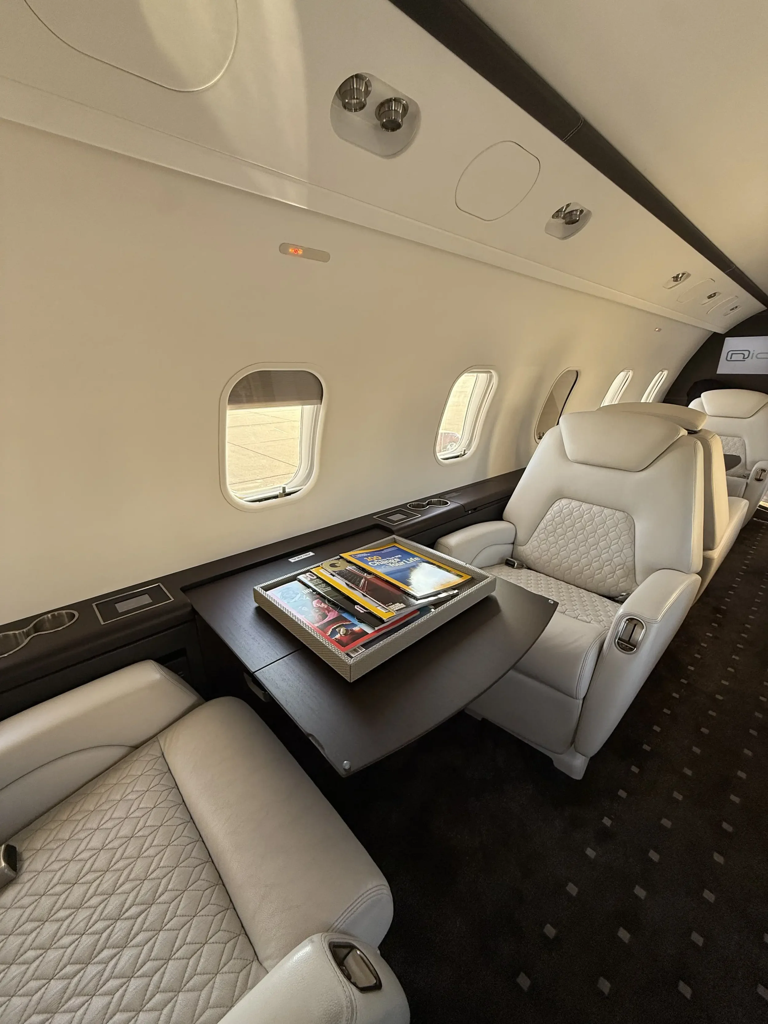 Private jet interior showcasing a clean detail on a Bombardier Challenger 300 detailed by Pure Aviation Detailing at ROG KROG in Rogers Arkansas at Rogers Executive and Municipal Airport.