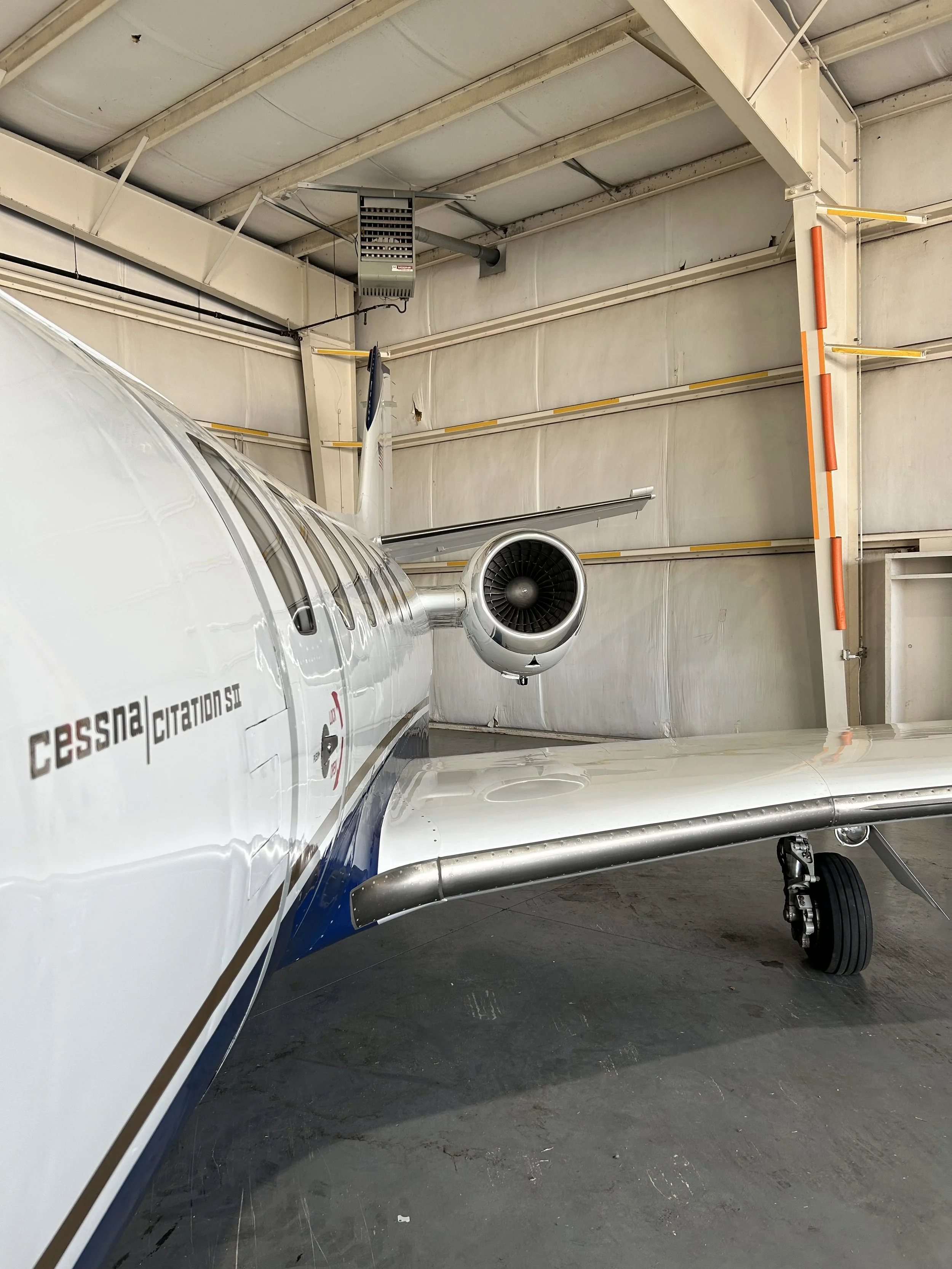 Close up of a Cessna Citation jet exterior wash and brightwork polishing service at LIT KLIT at Little Rock international Airport