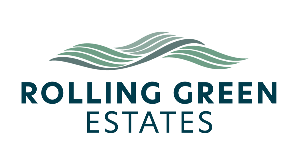 The logo of Ron Chomiak Studios featuring stylized waves or abstract shapes in shades of green and gray above the studio name written in bold black text.