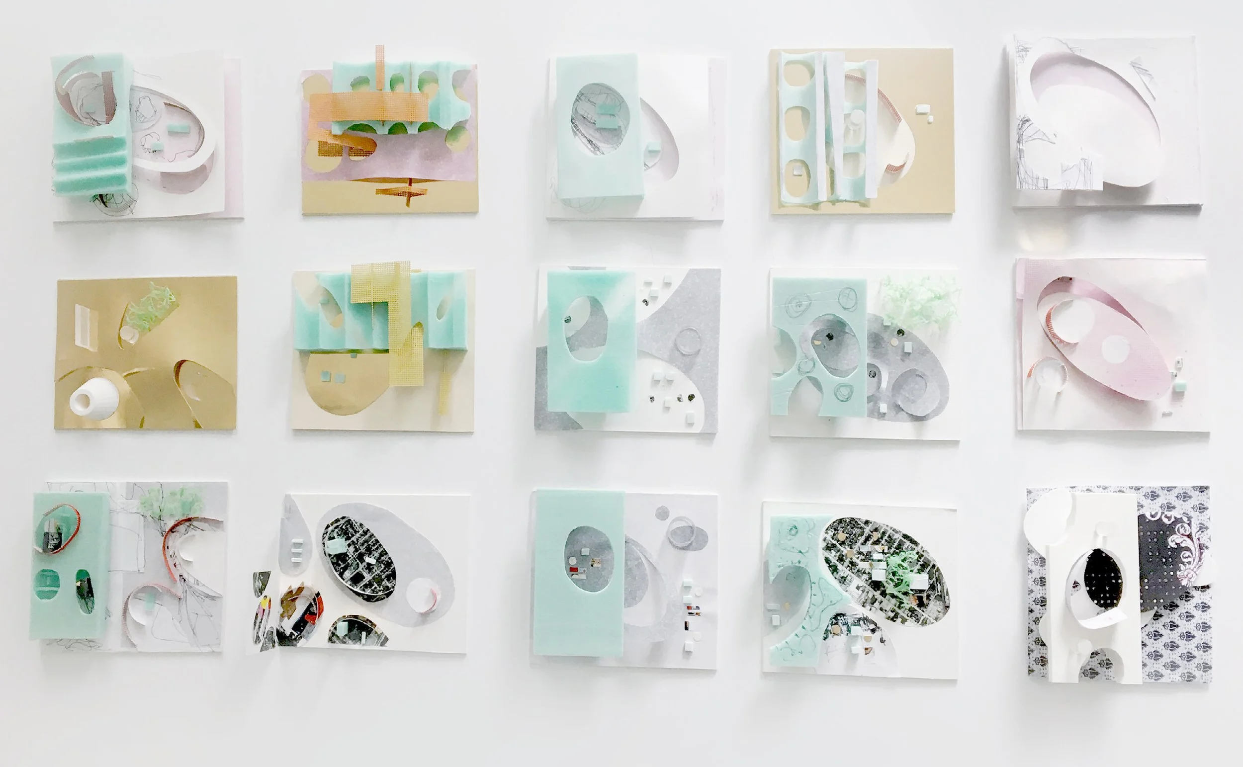 A wall display of 15 abstract, mixed-media art pieces arranged in a grid pattern, featuring layered cutouts, various shapes, and pastel colors.