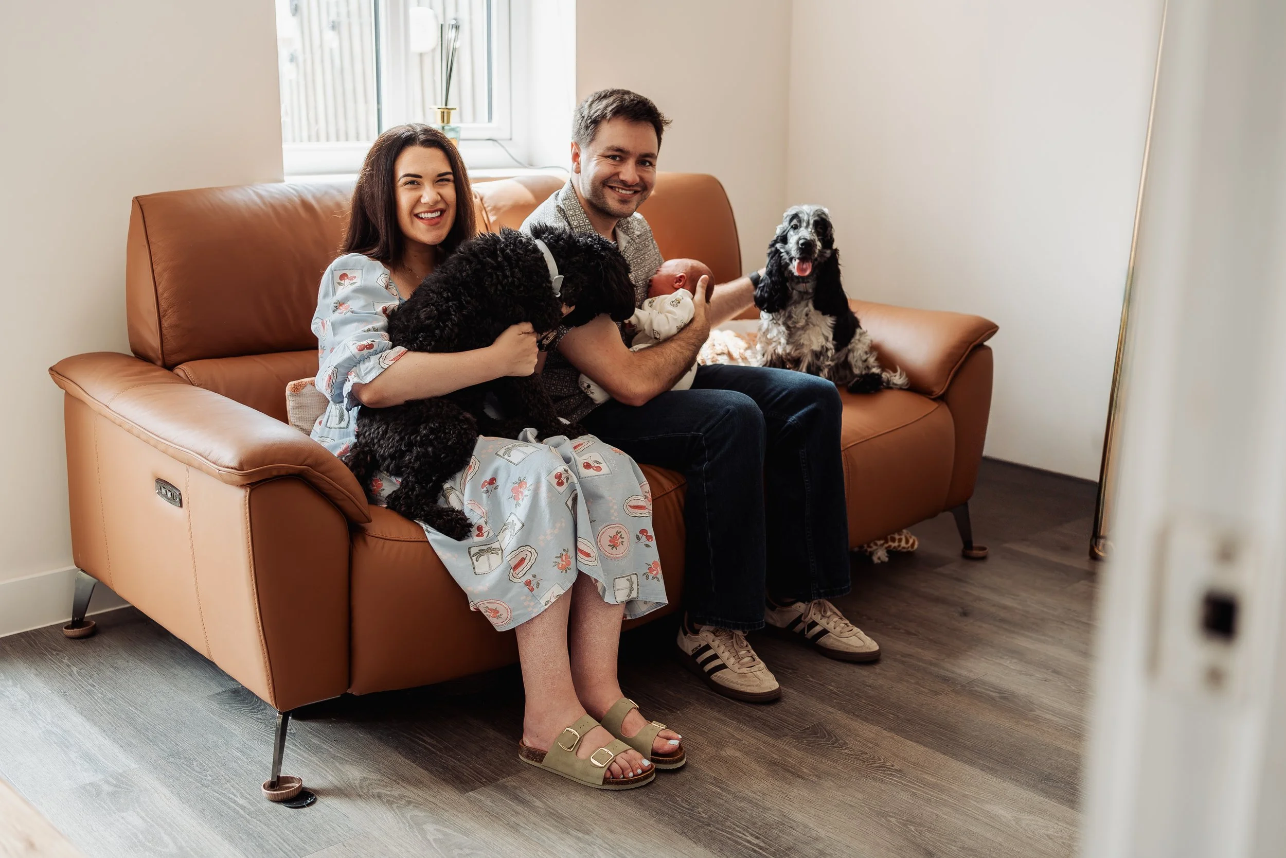 Newborn sessions — at home, including the whole family (and your pets)