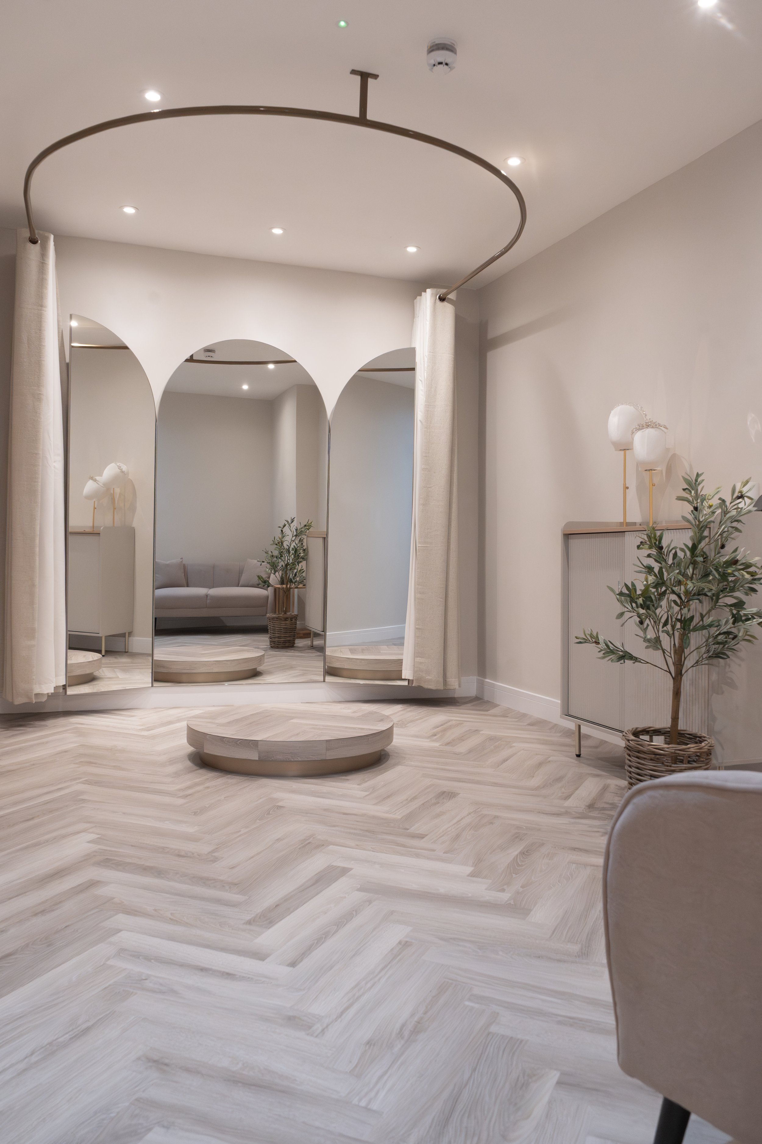 Another image of the large beautiful fitting rooms. Olive tree, Cream, beige interior with modern fixtures